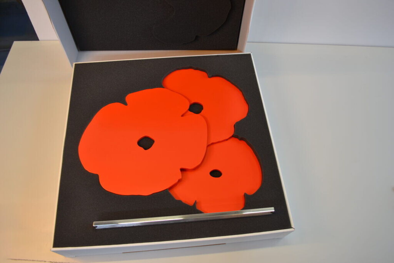 Artwork by Donald Sultan, Red Poppies, Made of Painted aluminum on polished aluminum base 