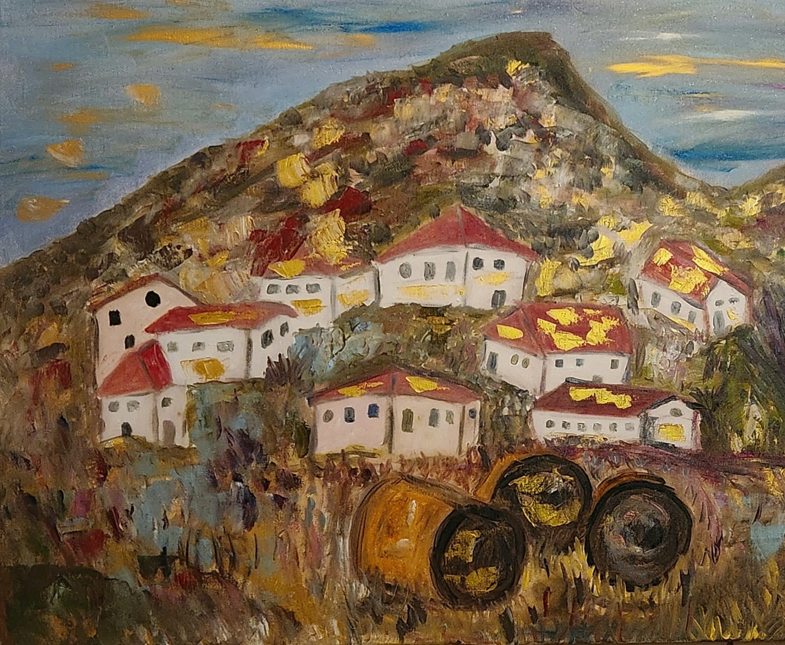 A painting of a village on a hillside with hay bales.