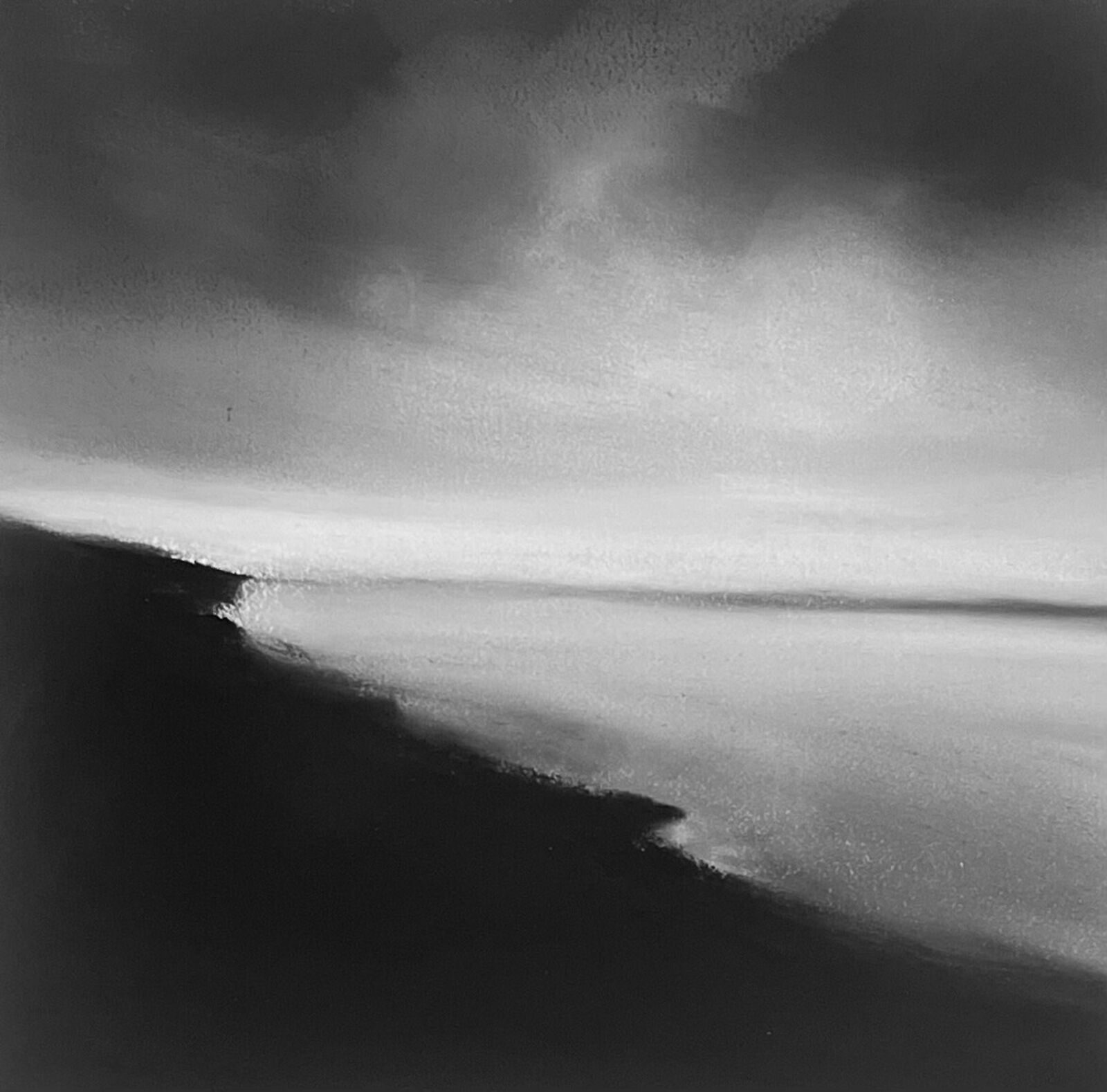A monochromatic seascape painting depicting a dark, jagged coastline under a vast, cloudy sky.