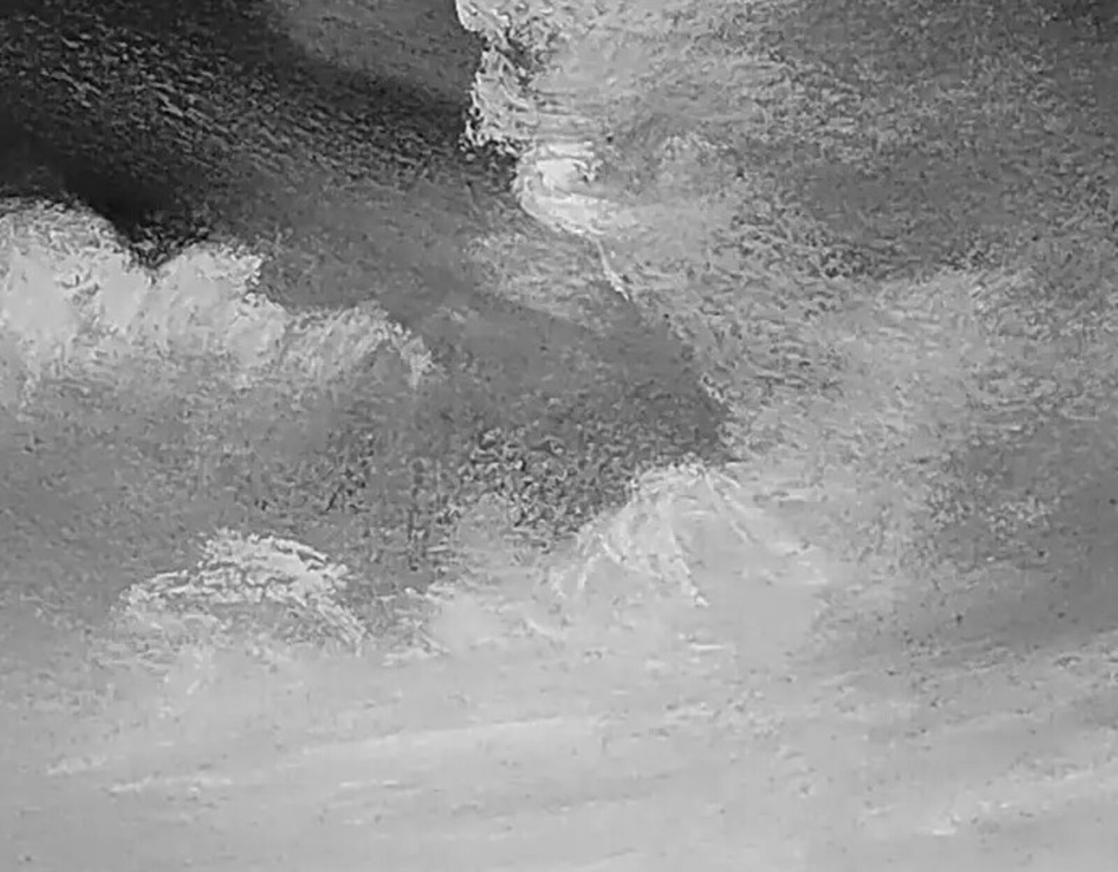 A moody monochrome seascape featuring a turbulent sky over a dark horizon.