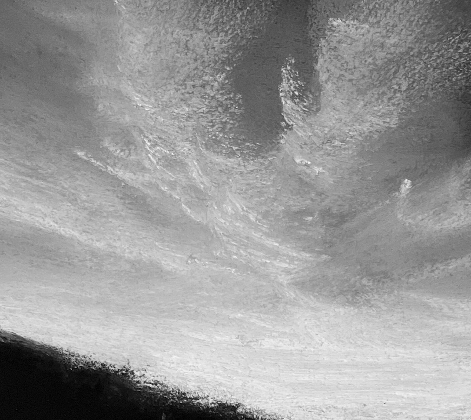 A monochromatic landscape painting featuring a dark valley under a textured sky.