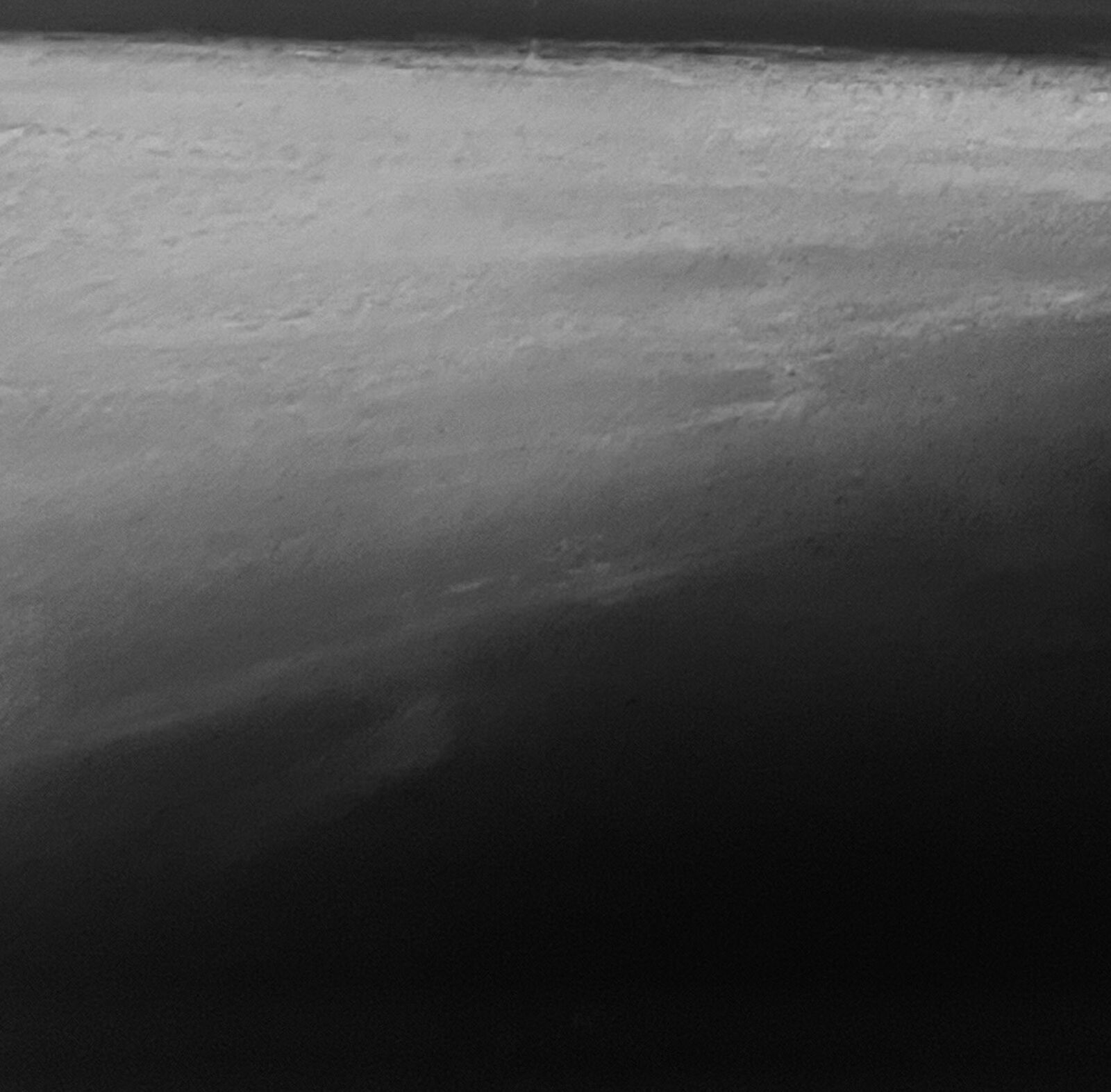 A monochrome seascape painting featuring a dark horizon line under a cloudy sky.