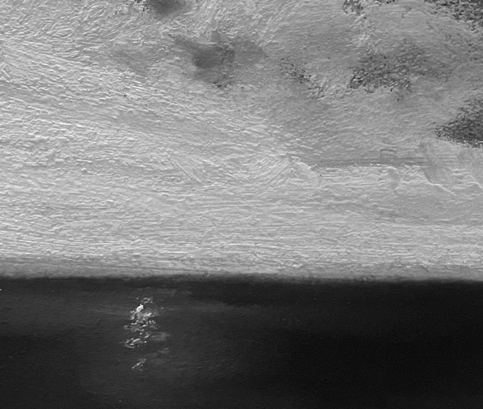 A monochromatic seascape painting featuring a turbulent sky and dark water.