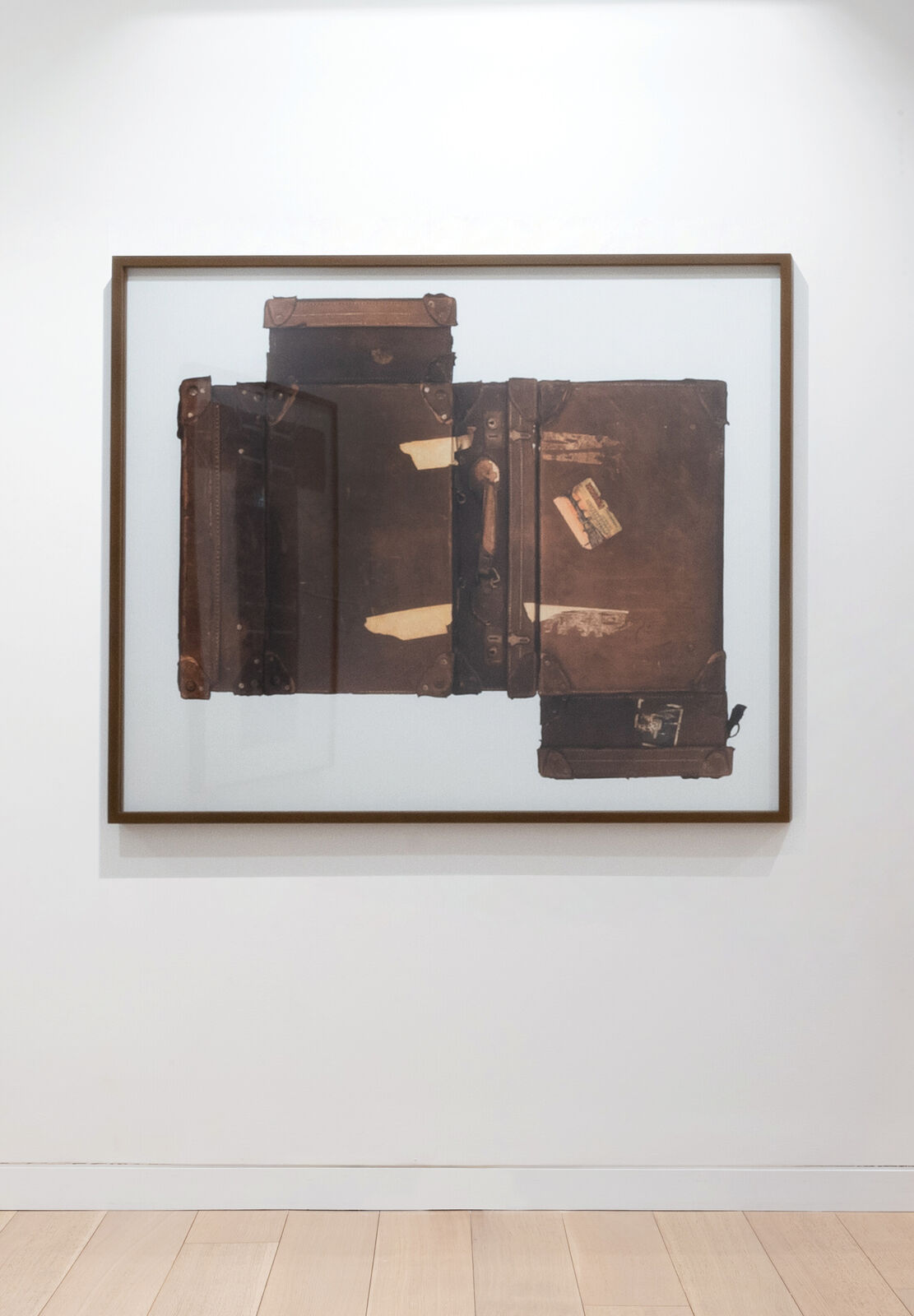 A picture hanging on a wall in a room.