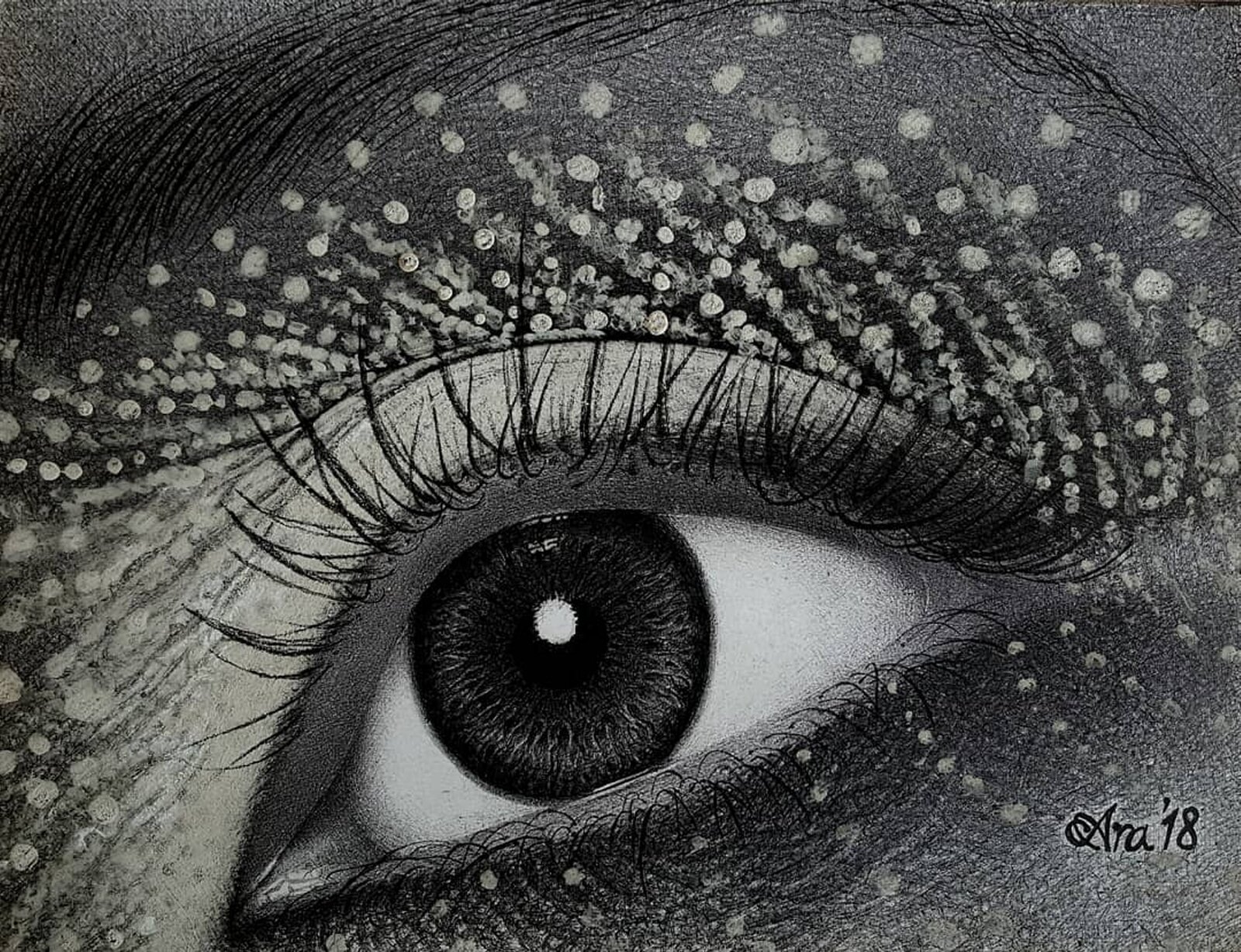 A hyper-realistic monochrome drawing of an eye filled with floating particles.