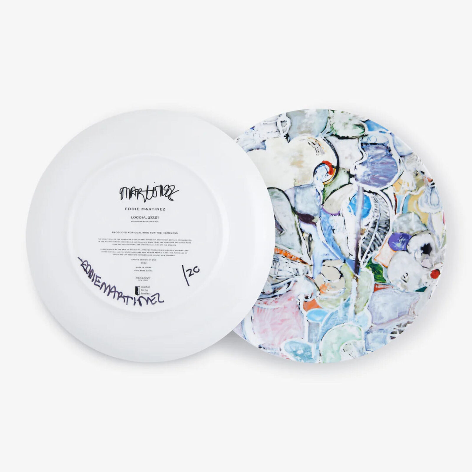 A circular painting on a white wall with a white background.