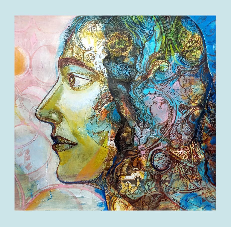 A painting of a woman's face with intricate designs on it.