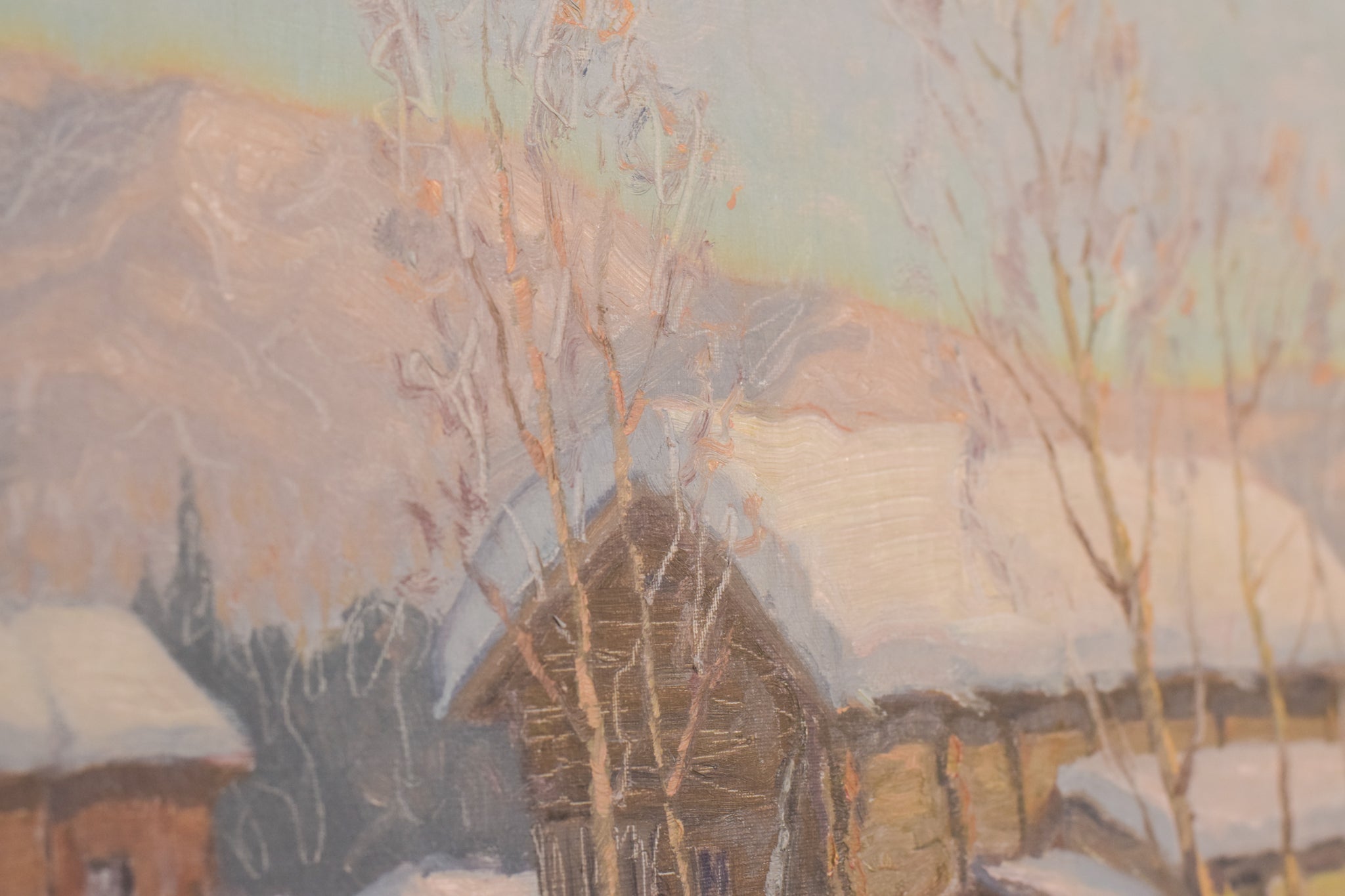 A painting of a snowy landscape with houses in the background.