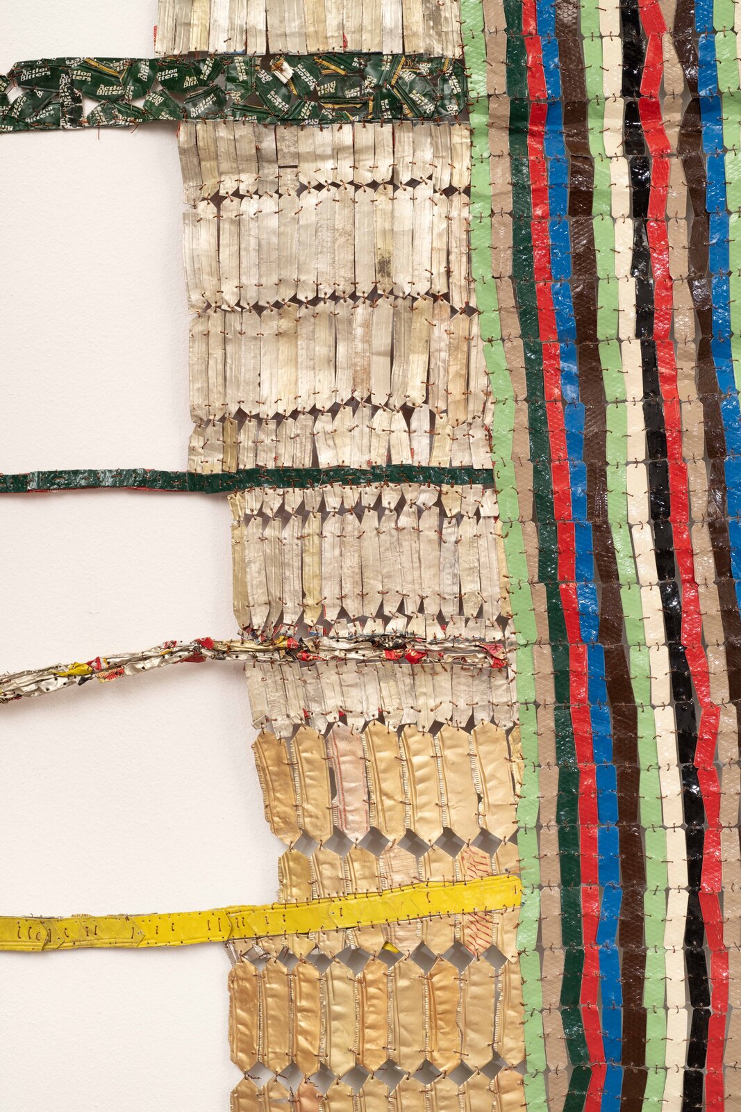 Artwork by El Anatsui, Drying Line, Made of Aluminium, copper wire and nylon string 