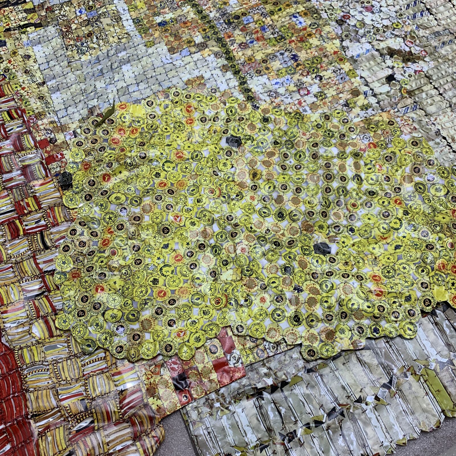 Artwork by El Anatsui, Checked Key, Made of Hand sculpted and formed UV cured acrylic resin inkjet on aluminum with irregular hand-cut edges and copper wire 