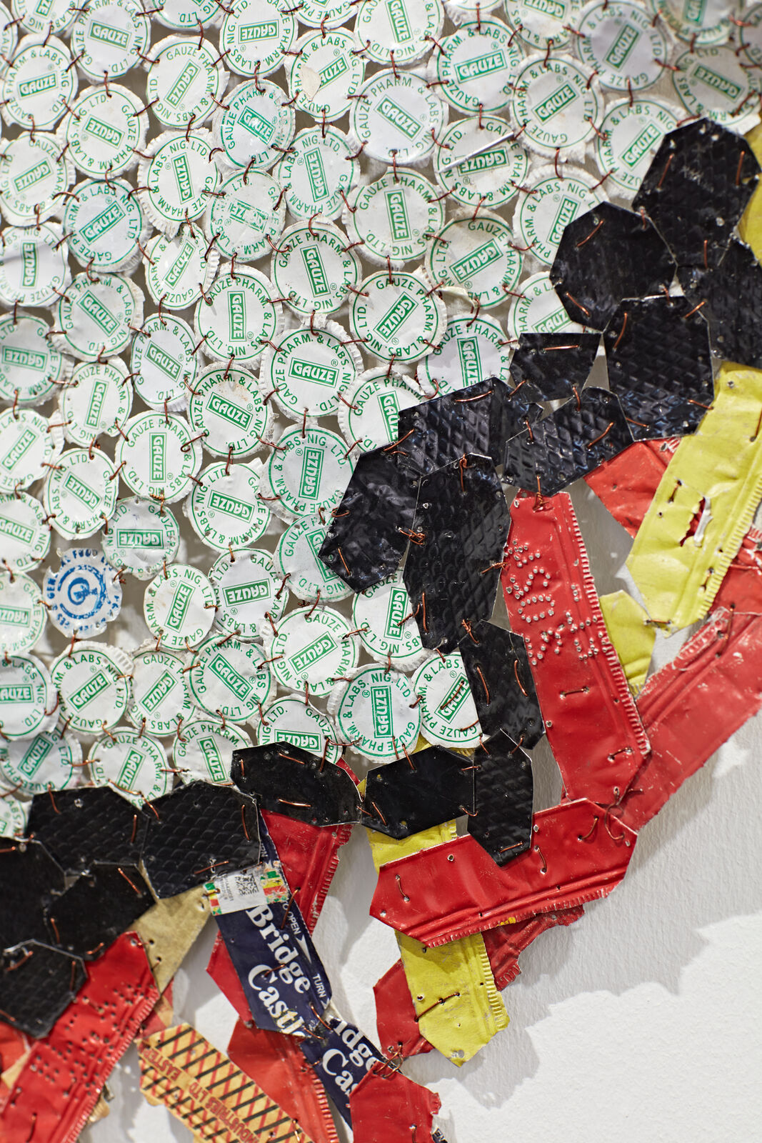 Artwork by El Anatsui, Fire on Ice, Made of Aluminium, copper wire and nylon string 