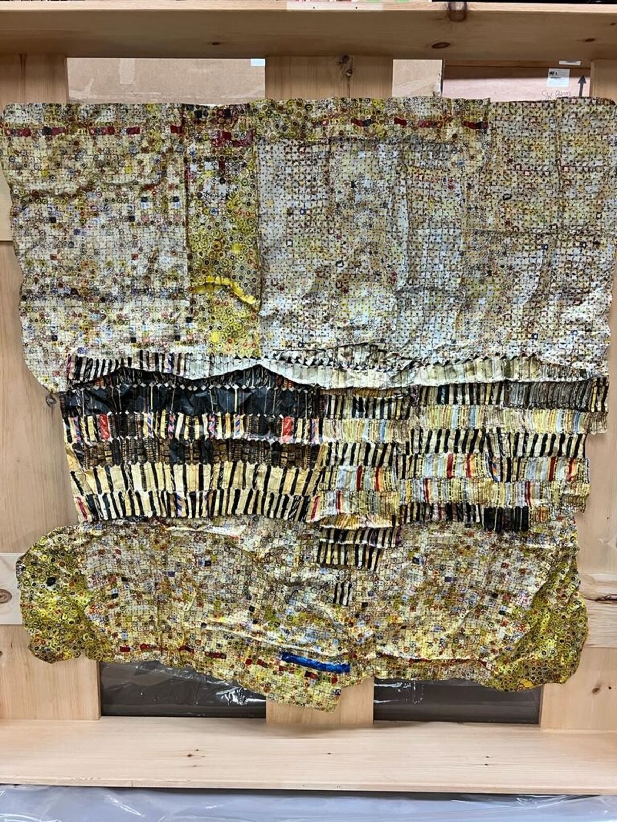 Artwork by El Anatsui, Gold Band, Made of Hand-sculpted and formed UV cured acrylic resin inkjet on aluminum with irregular hand-cut edges and copper wire 