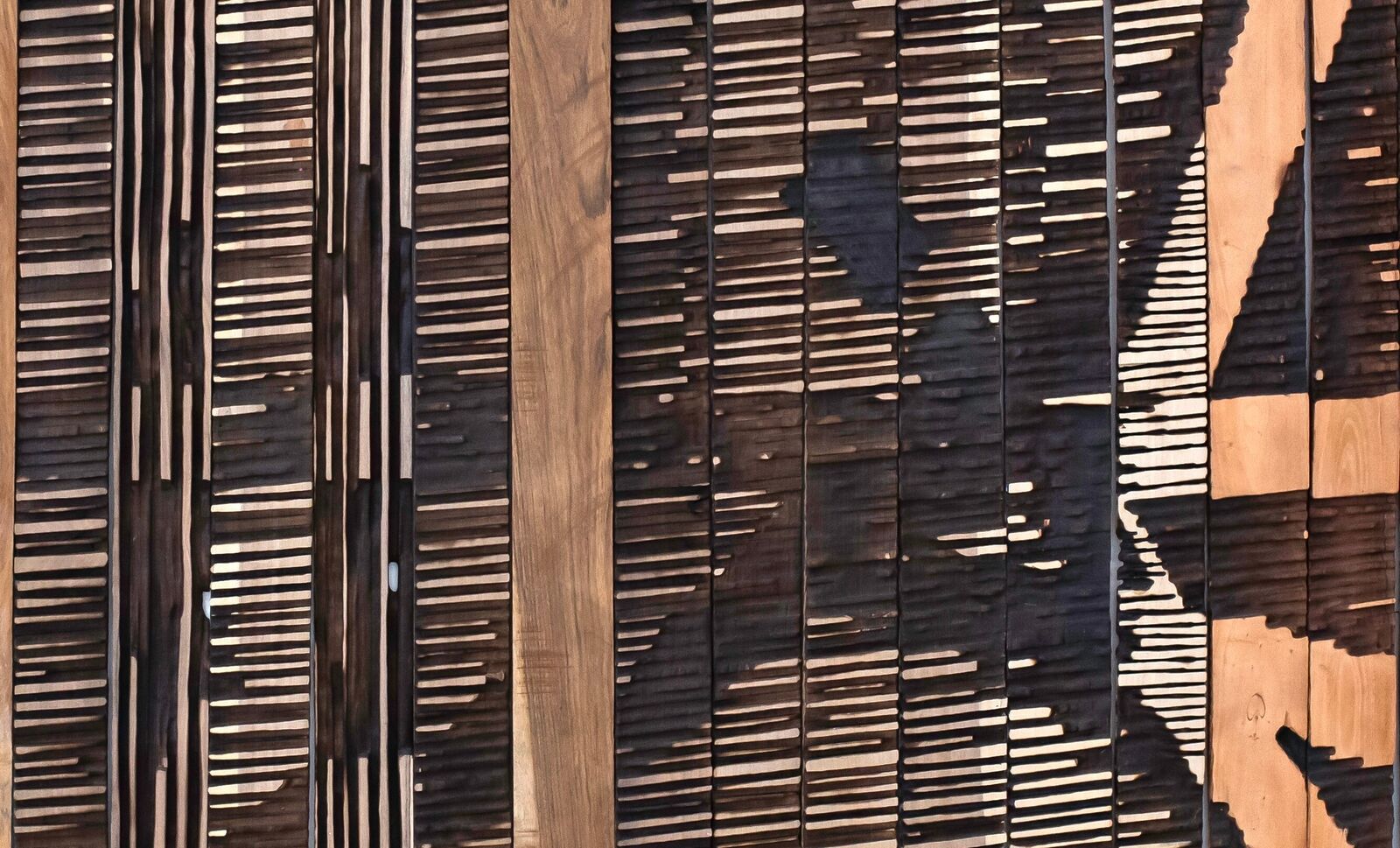 Artwork by El Anatsui, Keyboard of Life, Made of Tropical hardwood 