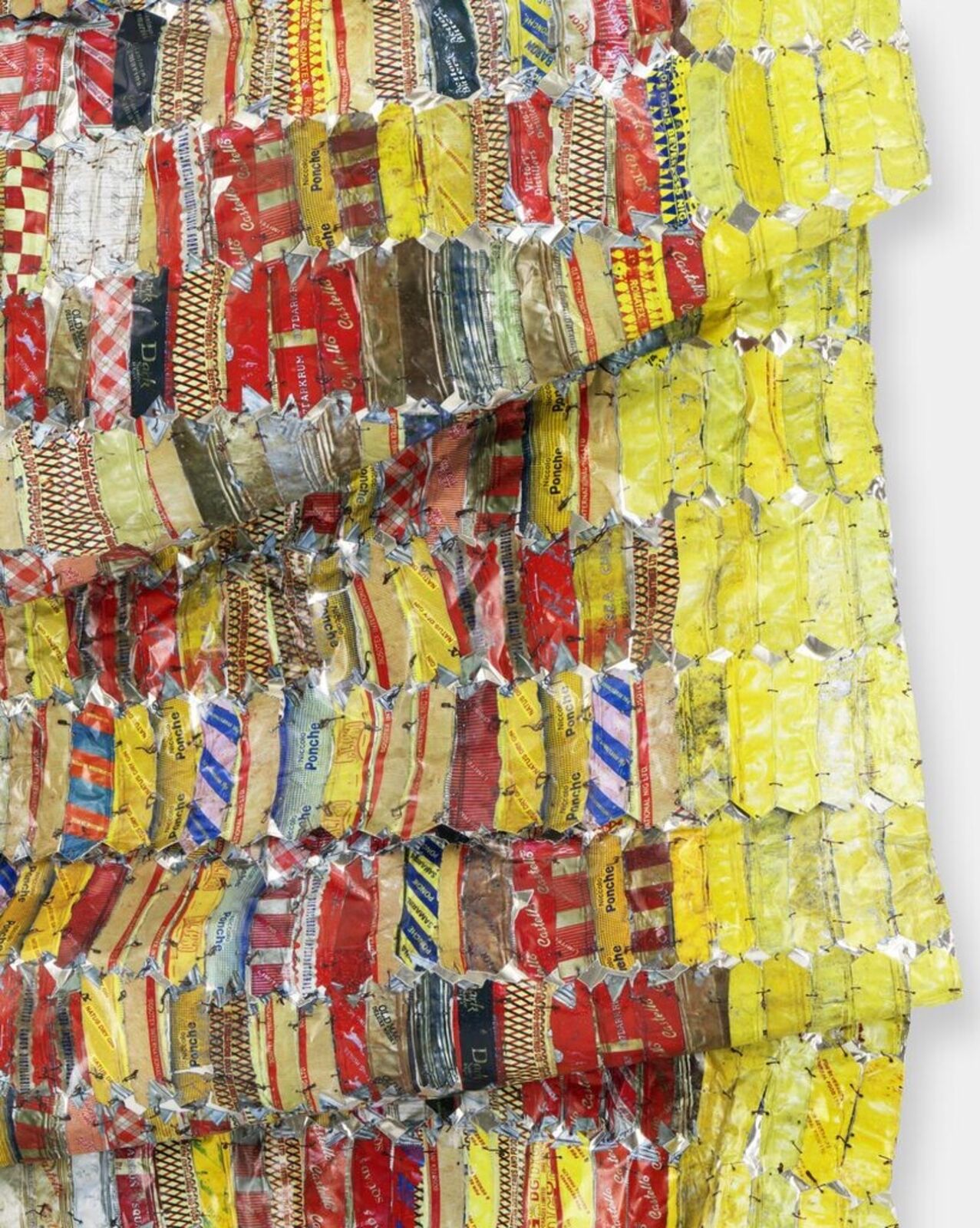 Artwork by El Anatsui, Metal Cloth, Made of Hand-sculpted and formed UV cured acrylic resin inkjet on aluminiumwith irregular hand-cut edges and copper wire 