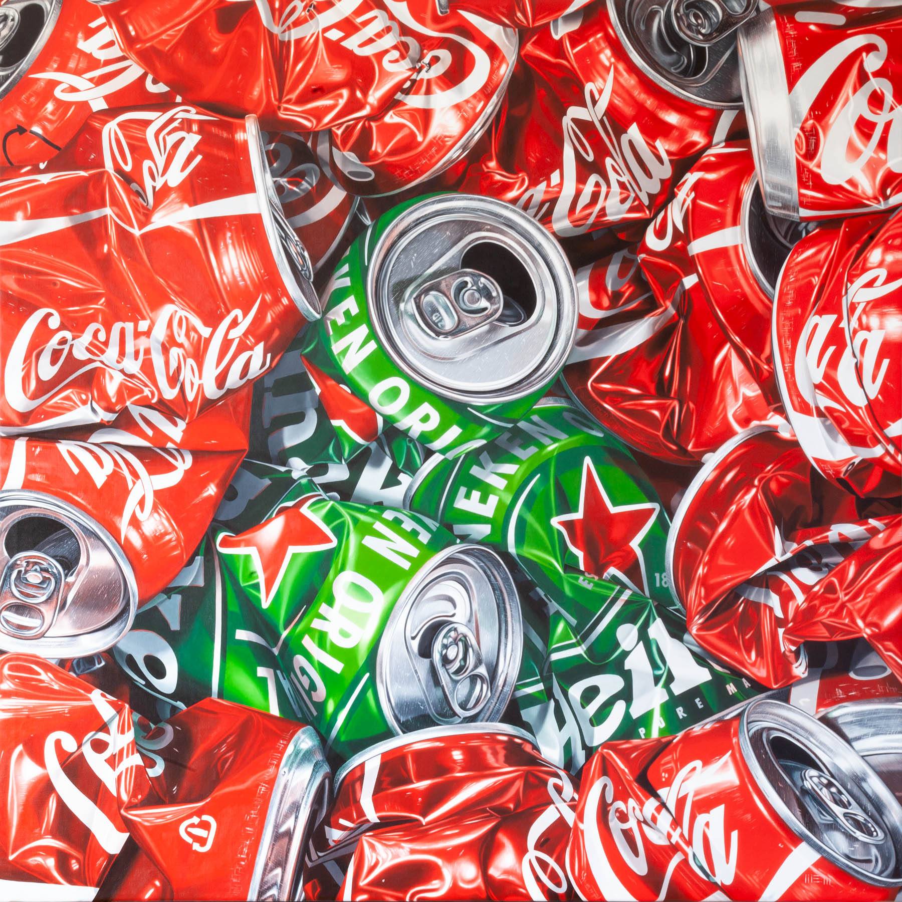 A pile of coca cola cans sitting on top of each other.