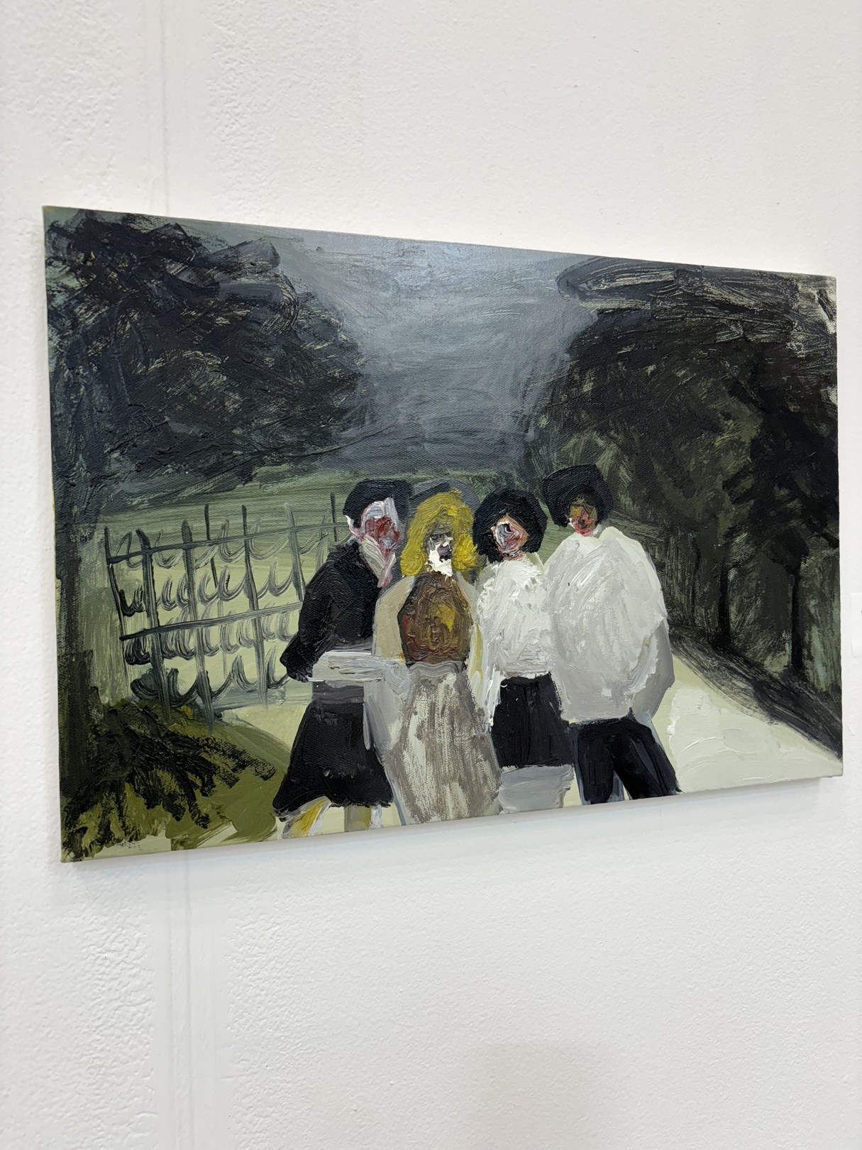 A painting of a group of people walking down a street.