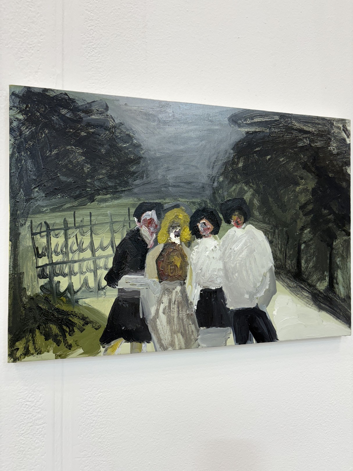 A painting of a group of people walking down a street.