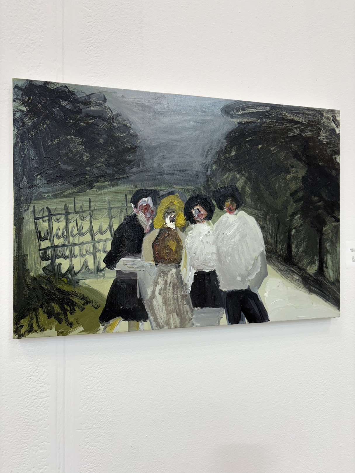 A painting of a group of people walking down a street.