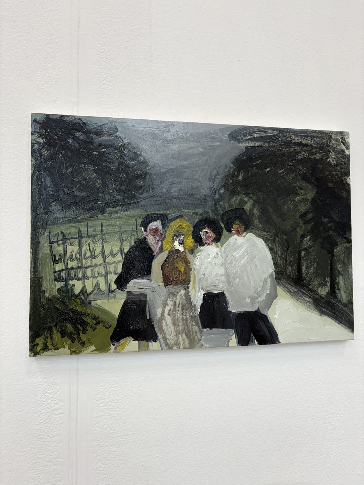 A painting of a group of people walking down a street.