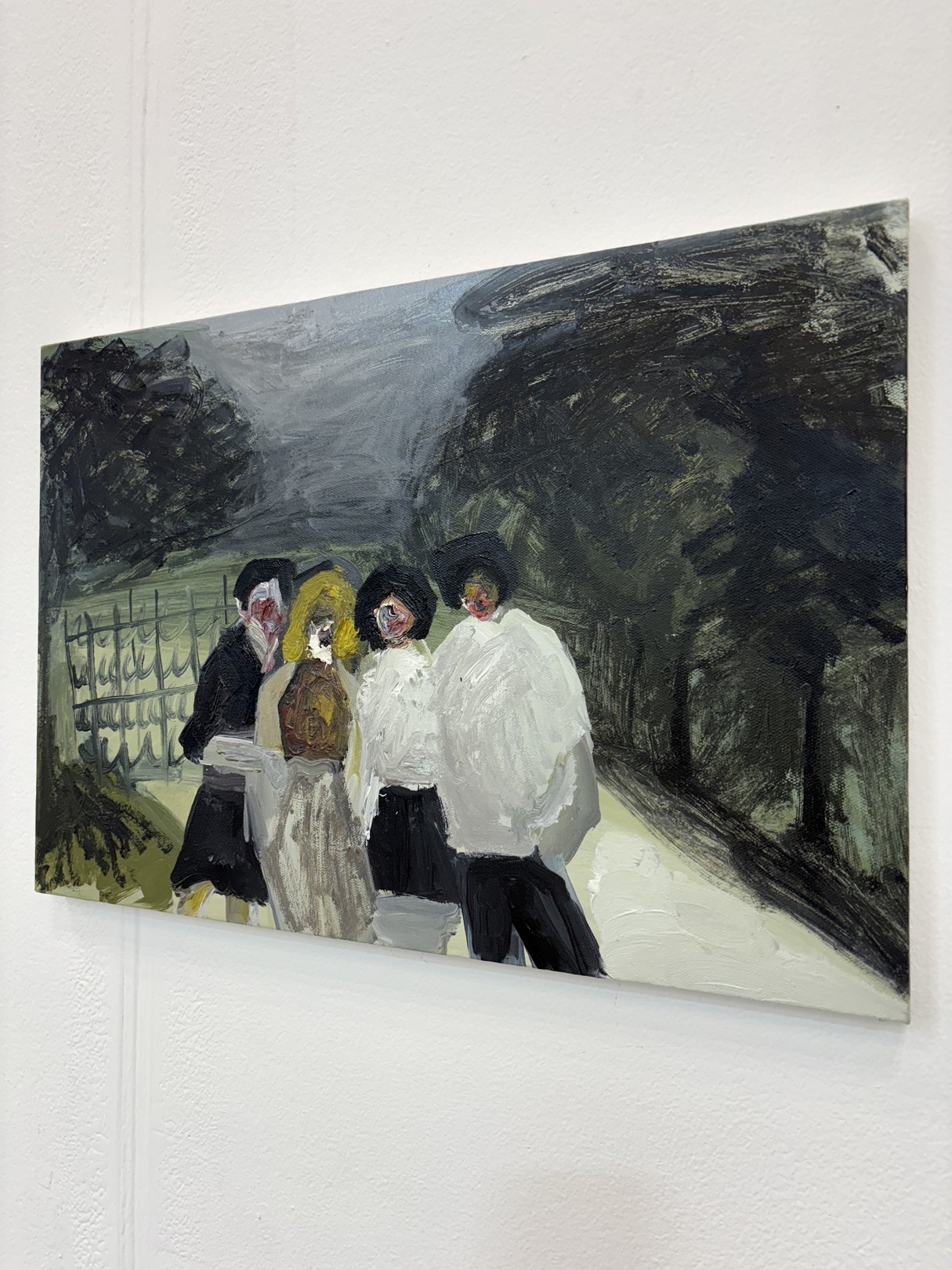 A painting of a group of people walking down a street.