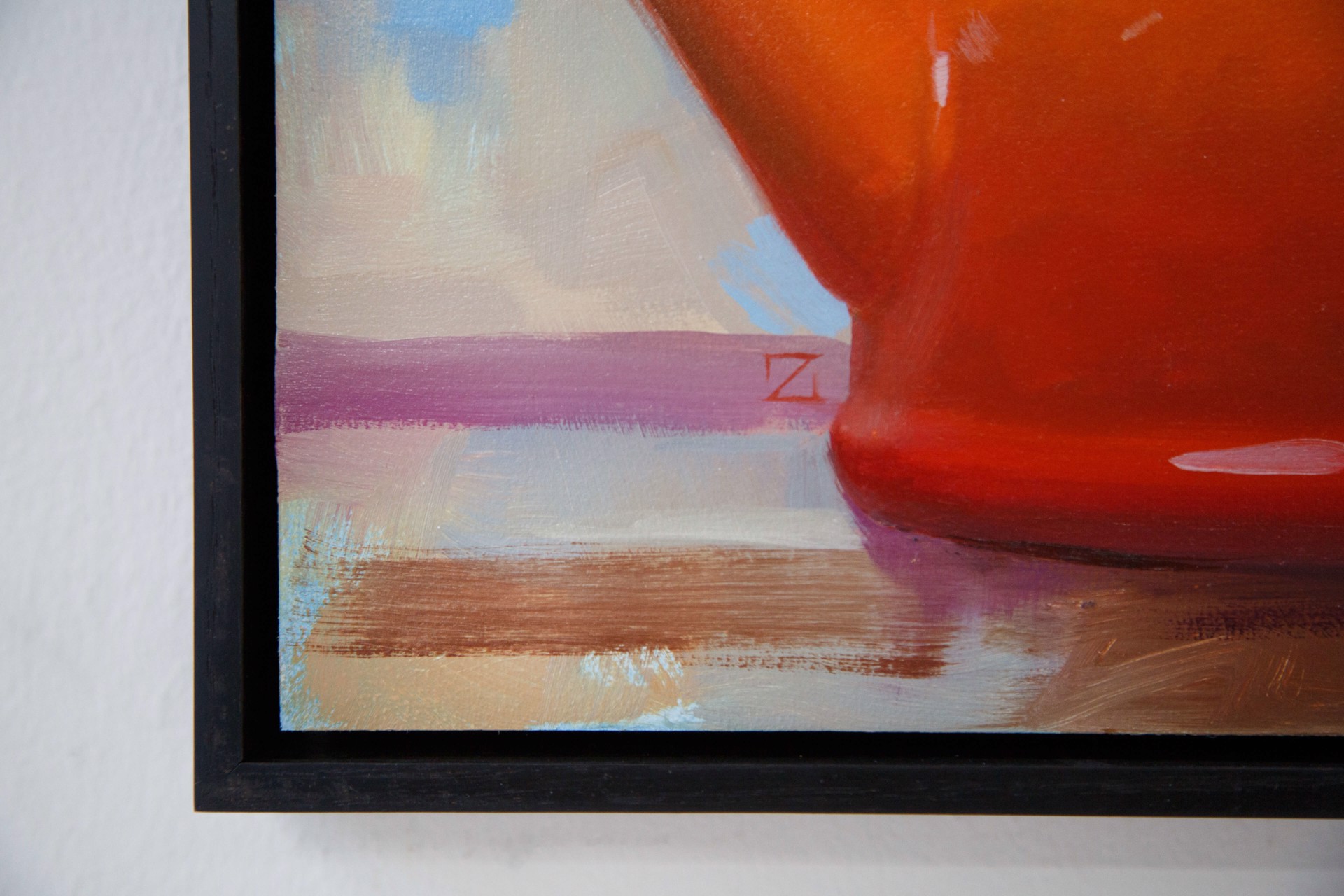 A painting of a red teapot with orange flowers in it.