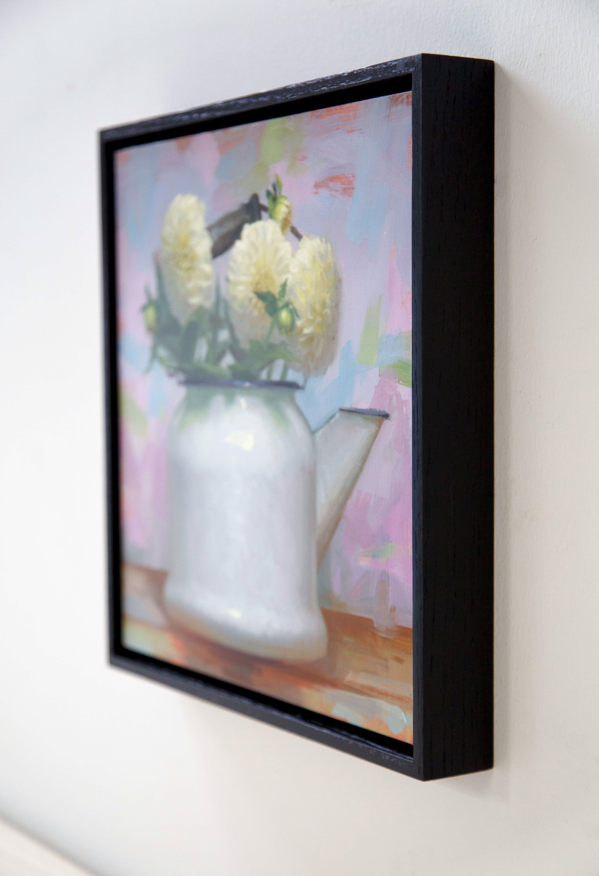 A painting of white flowers in a white watering can.