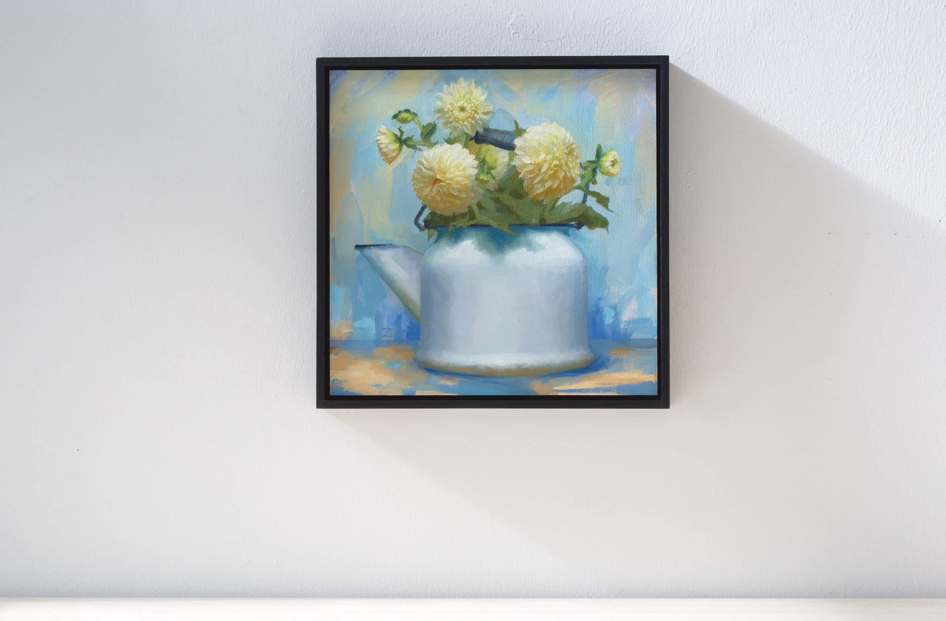 A still life painting of pale yellow flowers in a white watering can against a soft blue background.