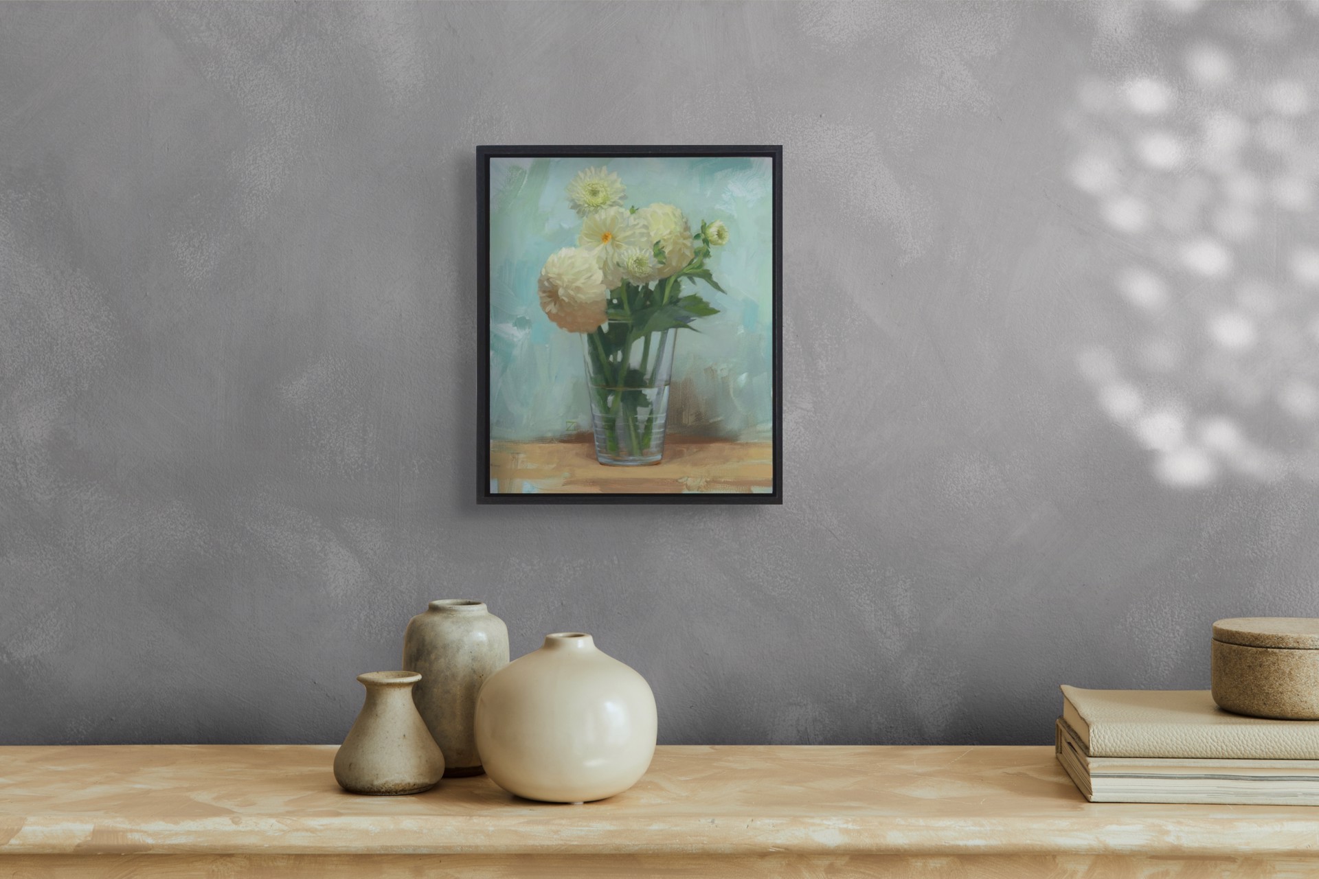 A still life painting of pale yellow flowers in a glass vase on a wooden surface.