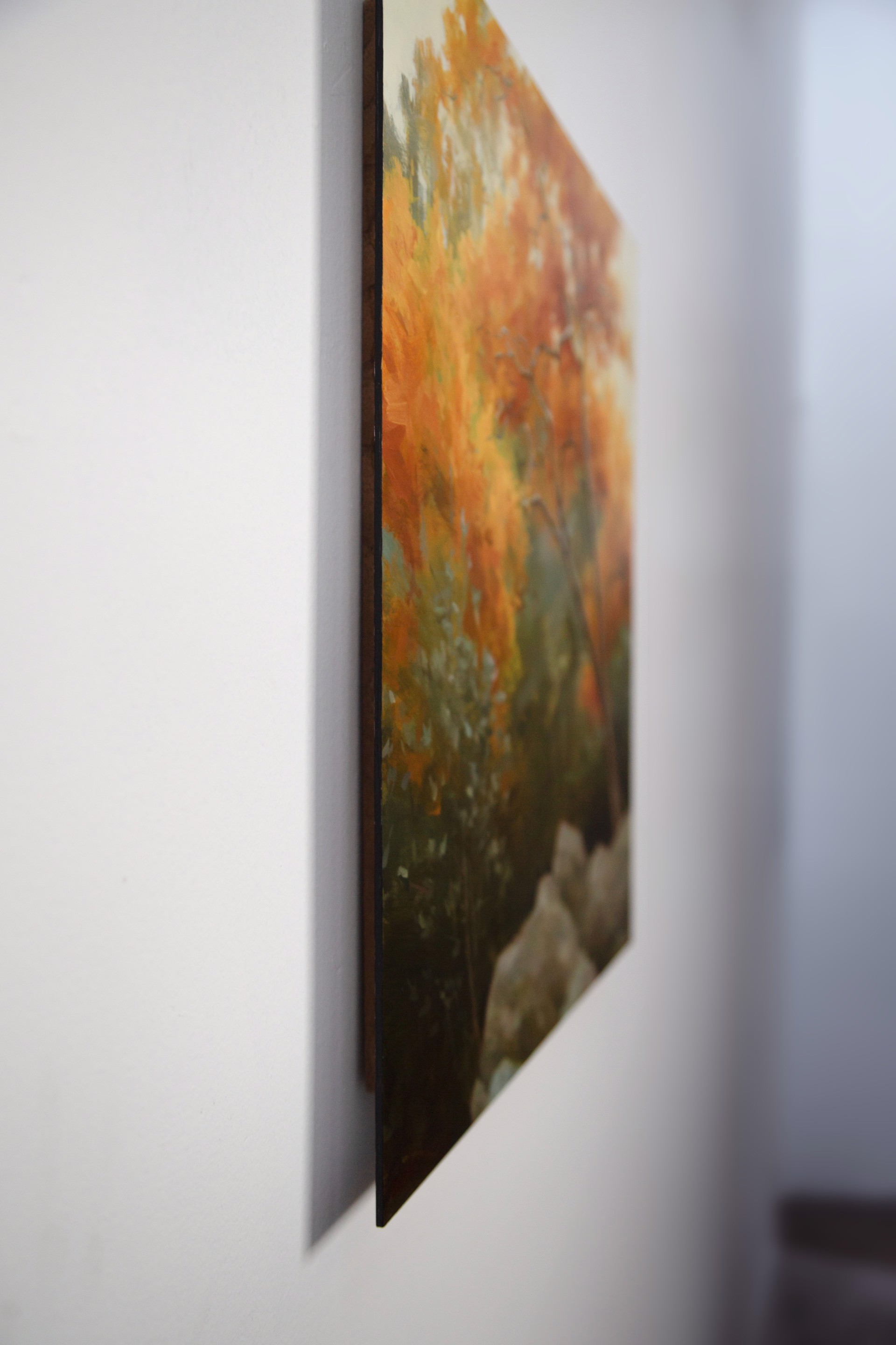 A painting of a tree in the middle of a forest.