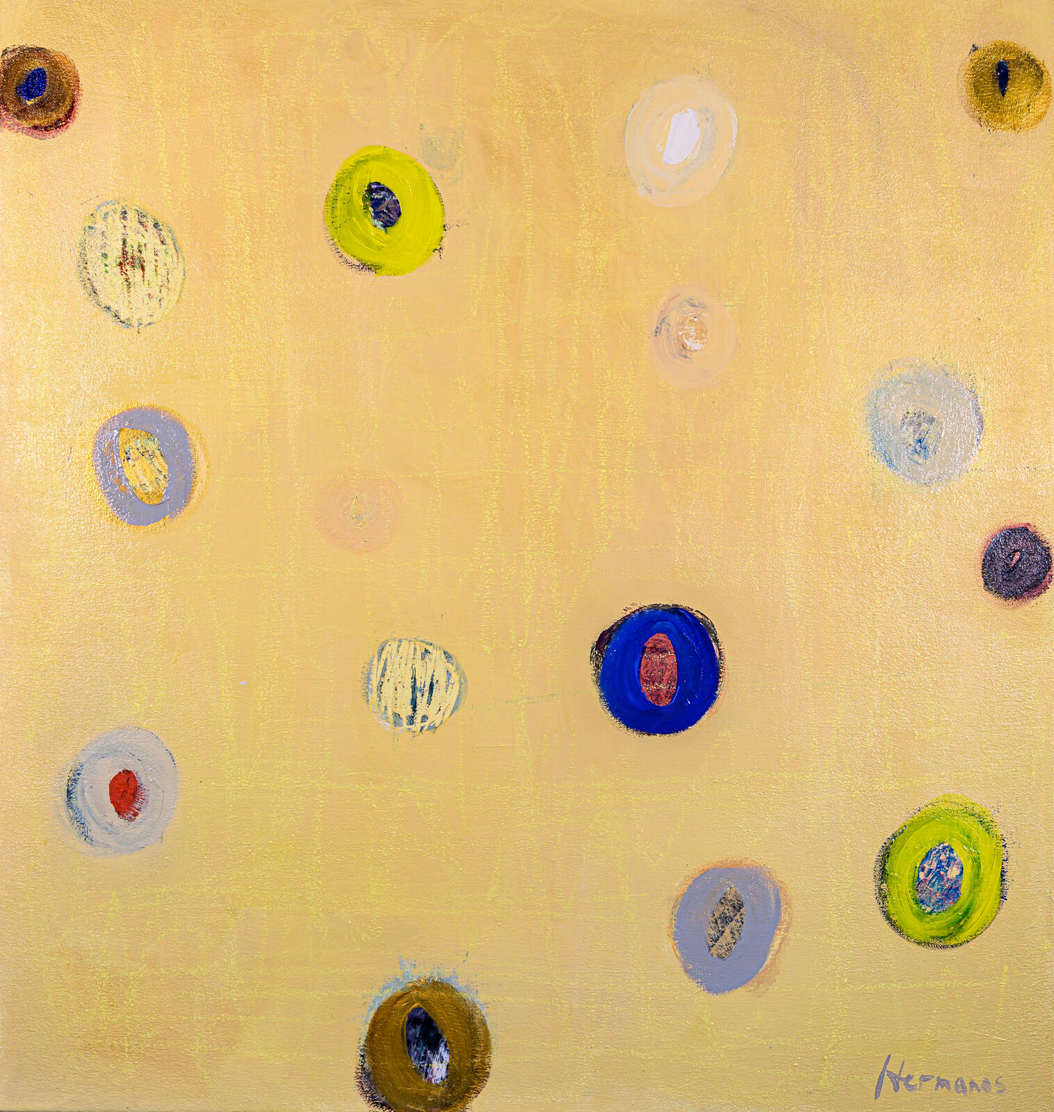 A vibrant abstract composition featuring scattered colorful circles on a textured golden-yellow canvas.