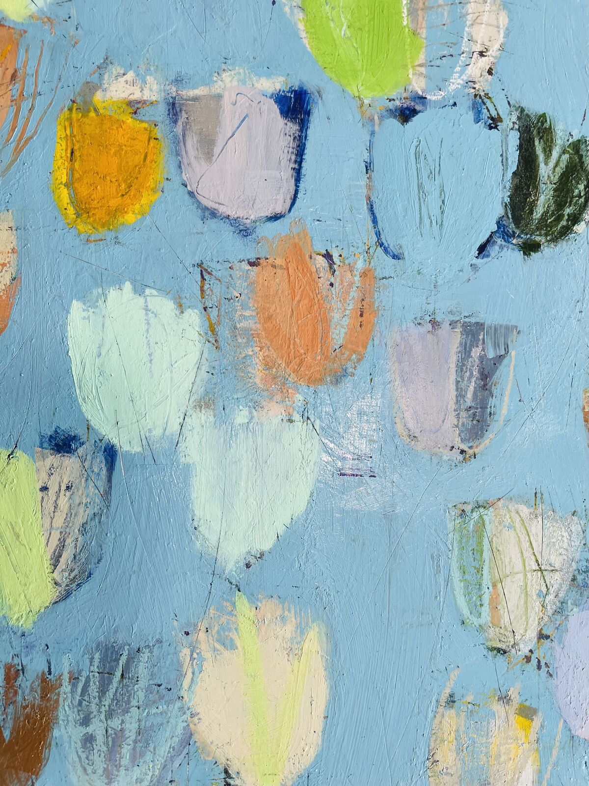 An abstract expressionist painting featuring a light blue background with scattered, colorful organic shapes.