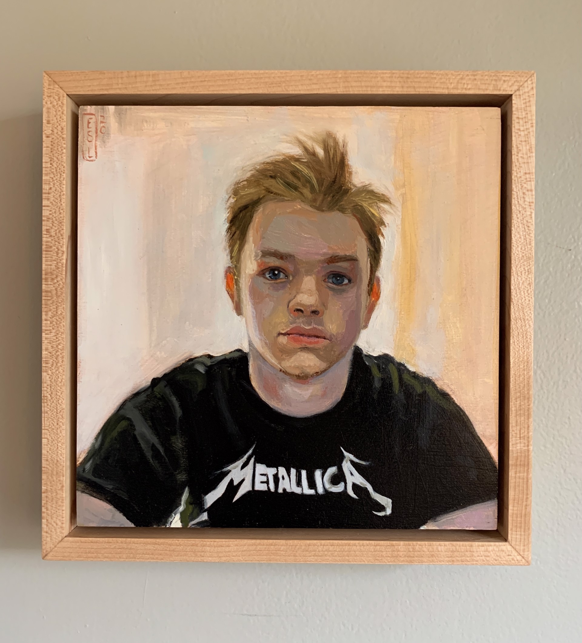 A painting of a young man wearing a Metallica shirt.