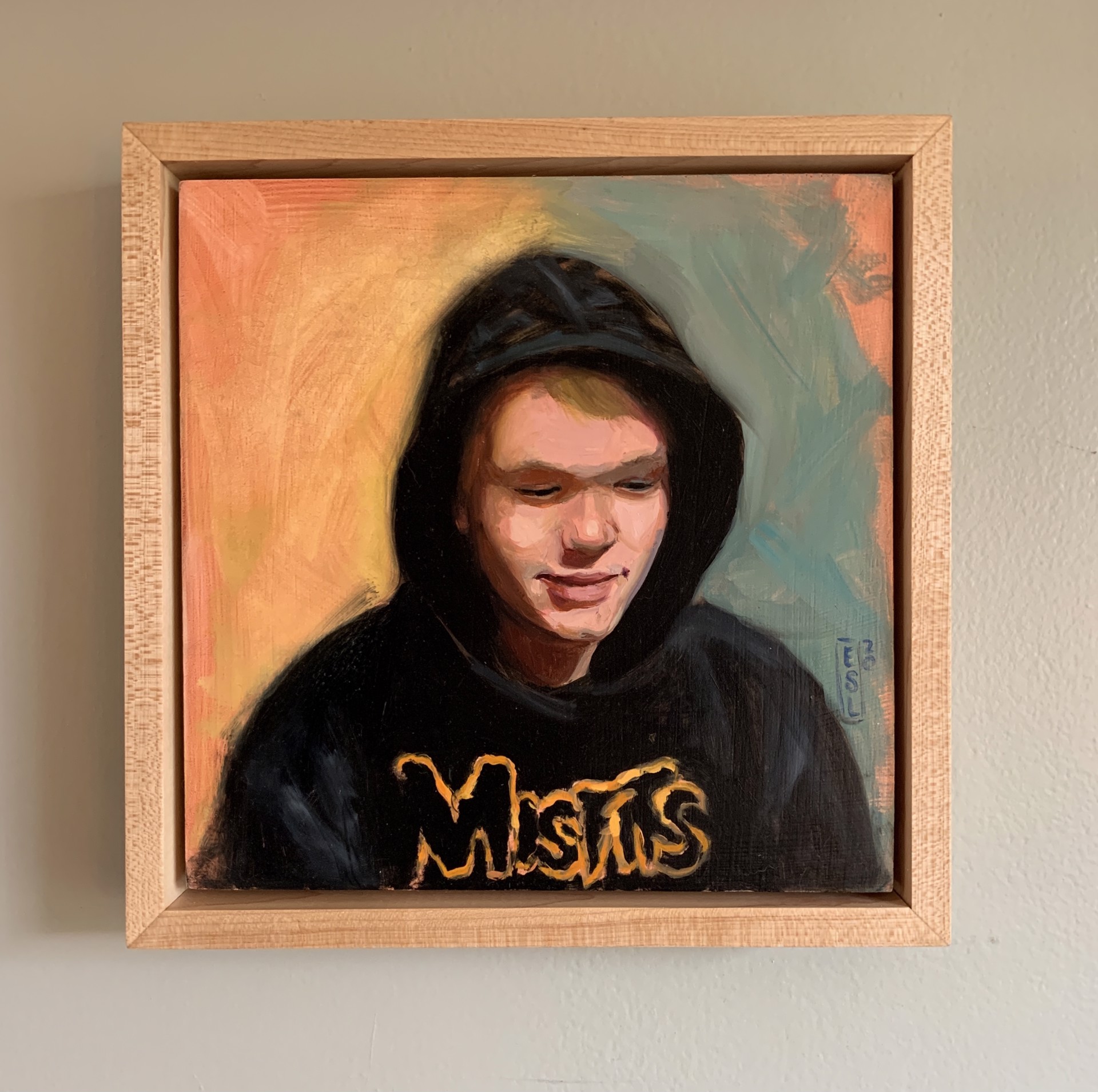 A painting of a young man wearing a black hoodie.