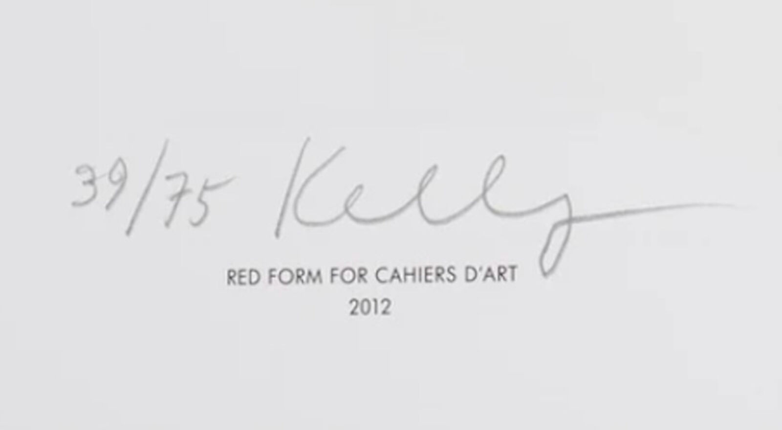 A bold red L-shaped geometric form on a plain white background.