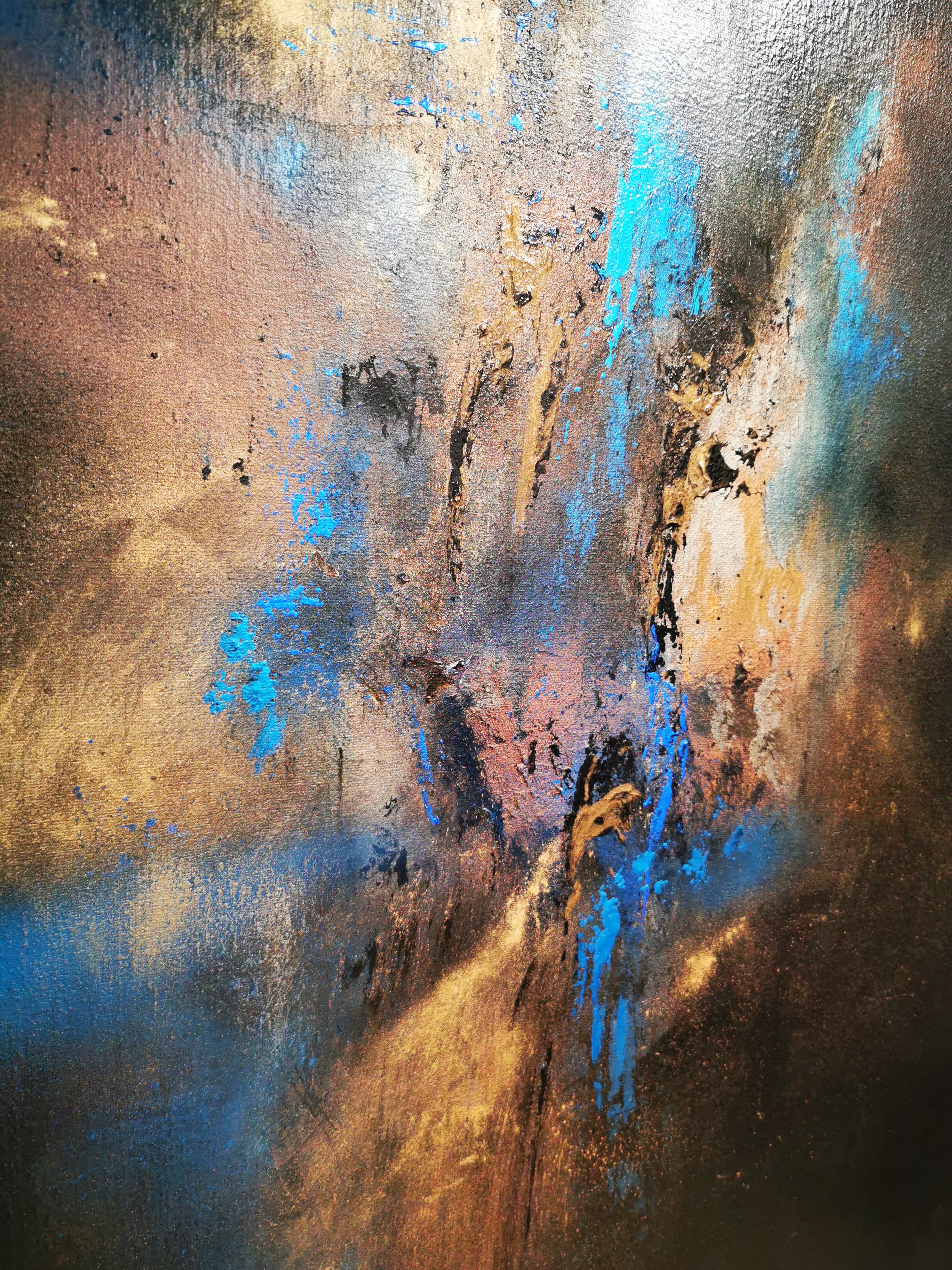 A close up of a painting on a wall. 