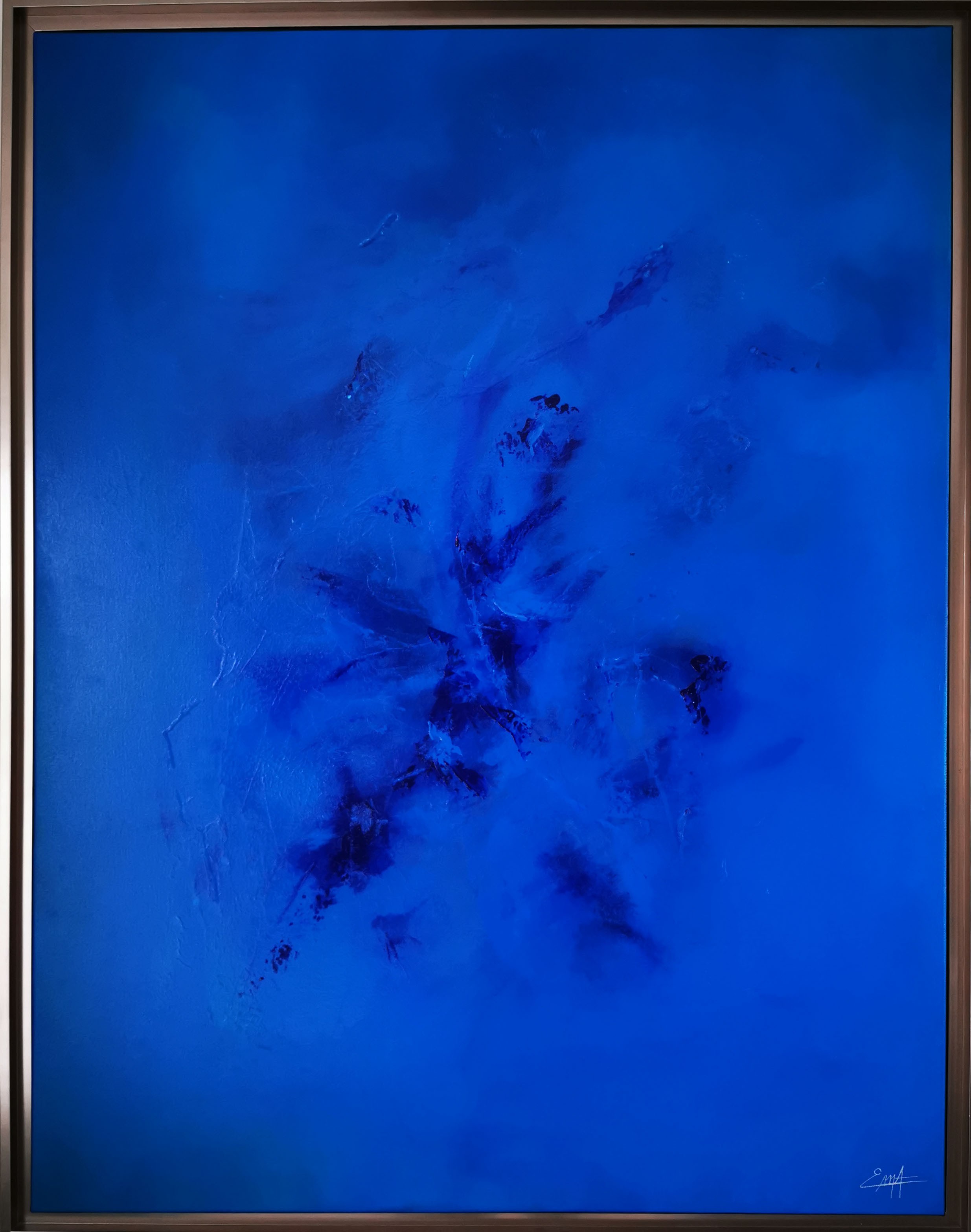 A painting of a blue sky with a black frame.