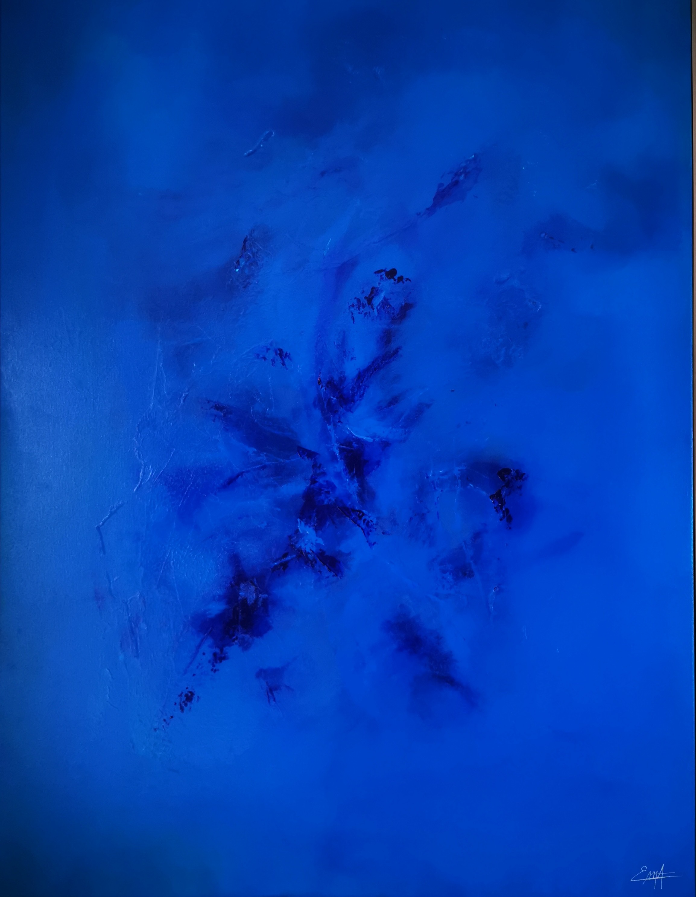 A painting of a blue sky with a black frame.