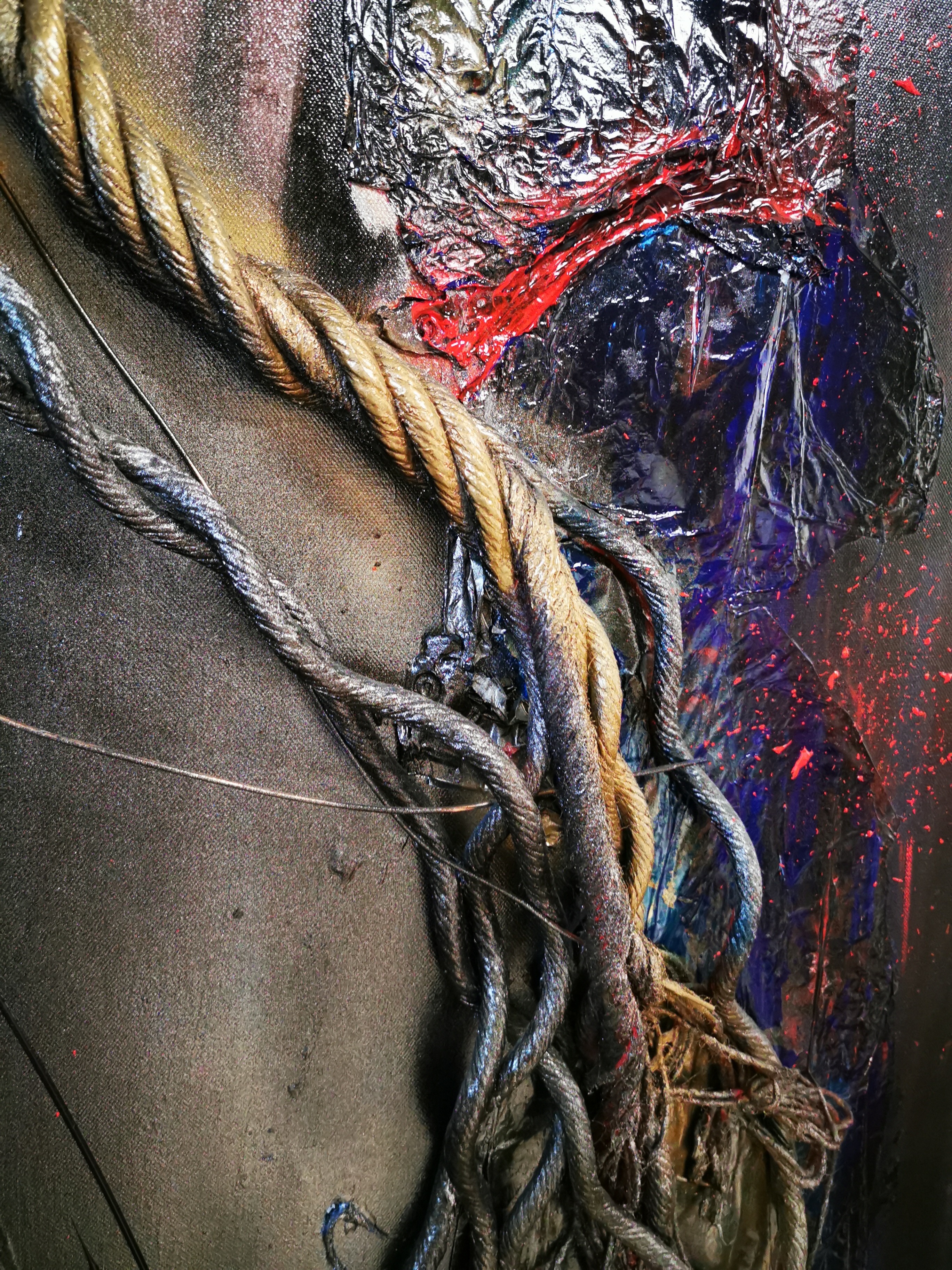 A painting hanging on a wall in a room.
