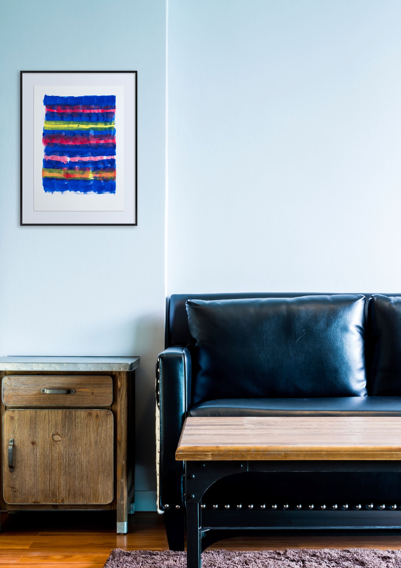 A painting of a blue, red, yellow, and green striped pattern.