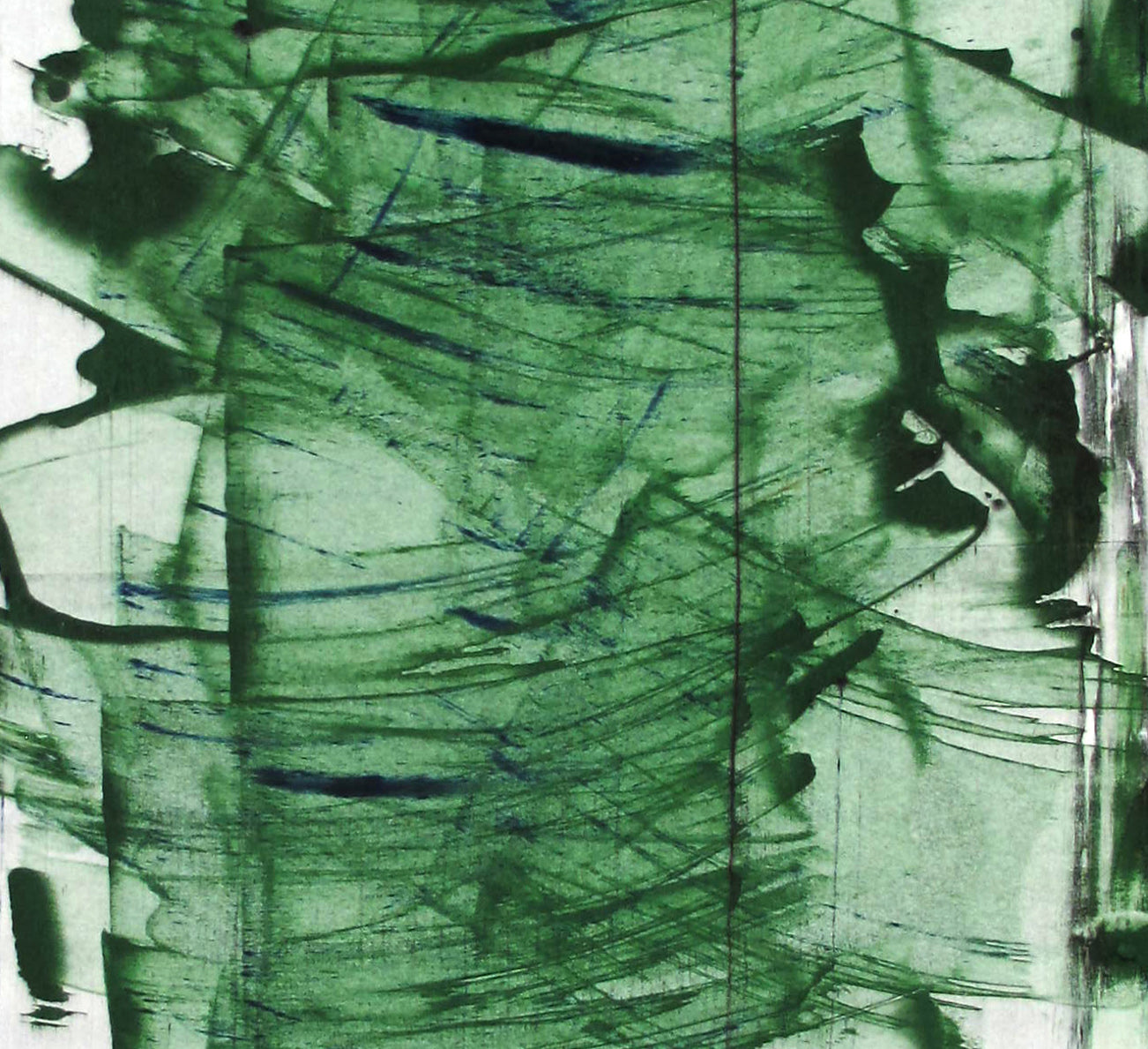 A piece of paper with a green and black design on it.
