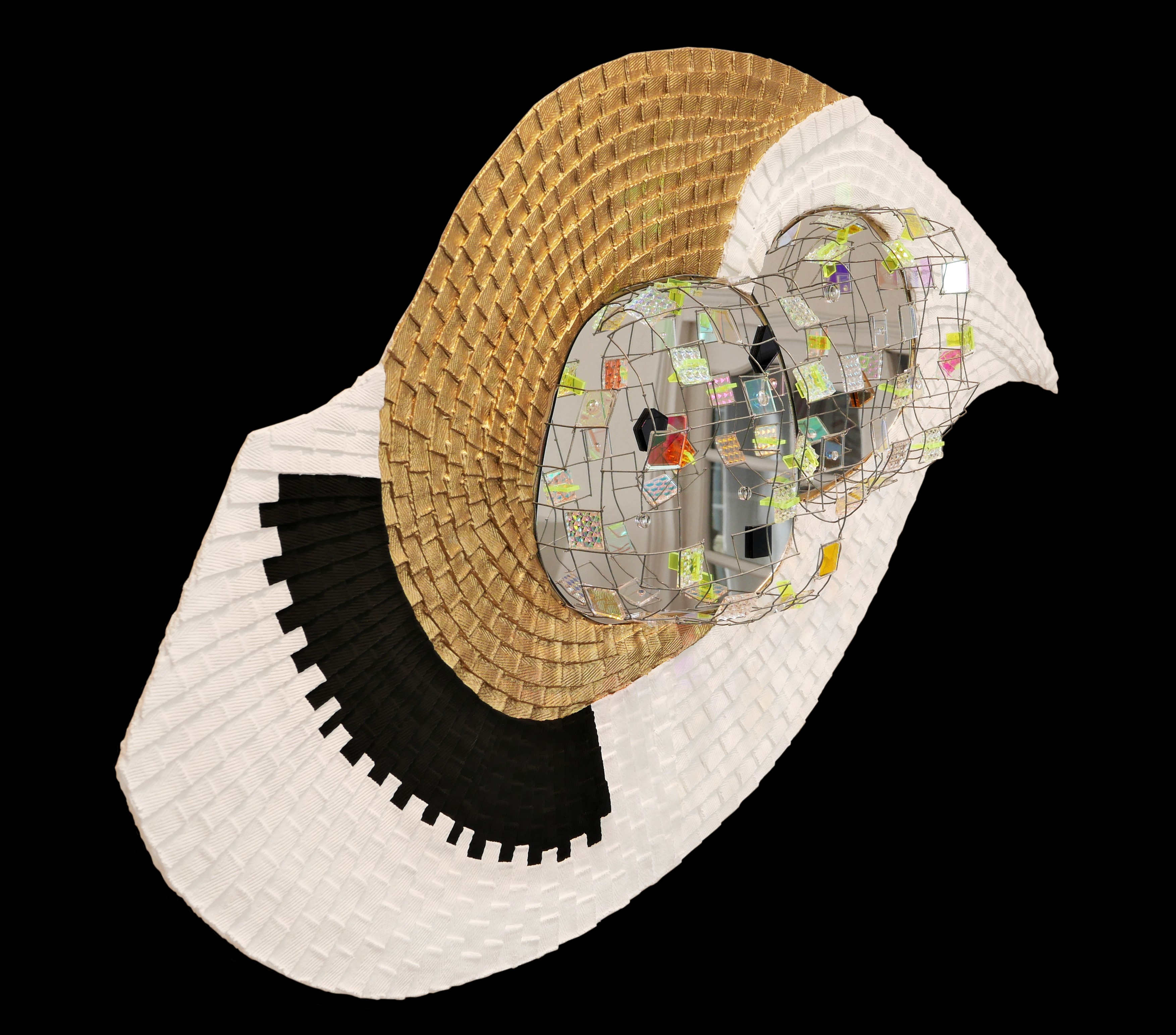 A white hat with a mirror ball on top of it.