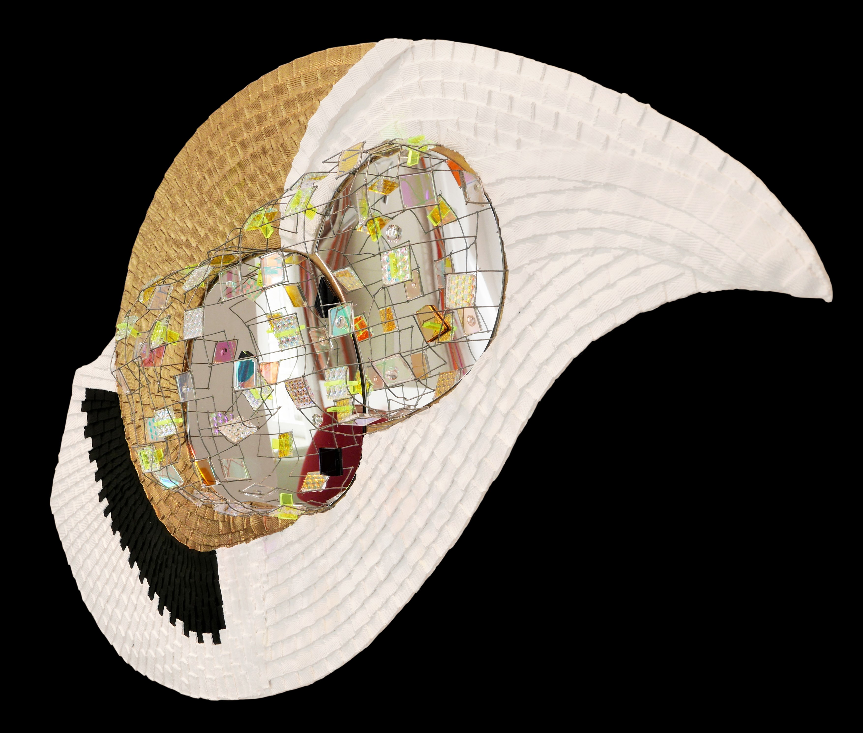 A white hat with a mirror ball on top of it.