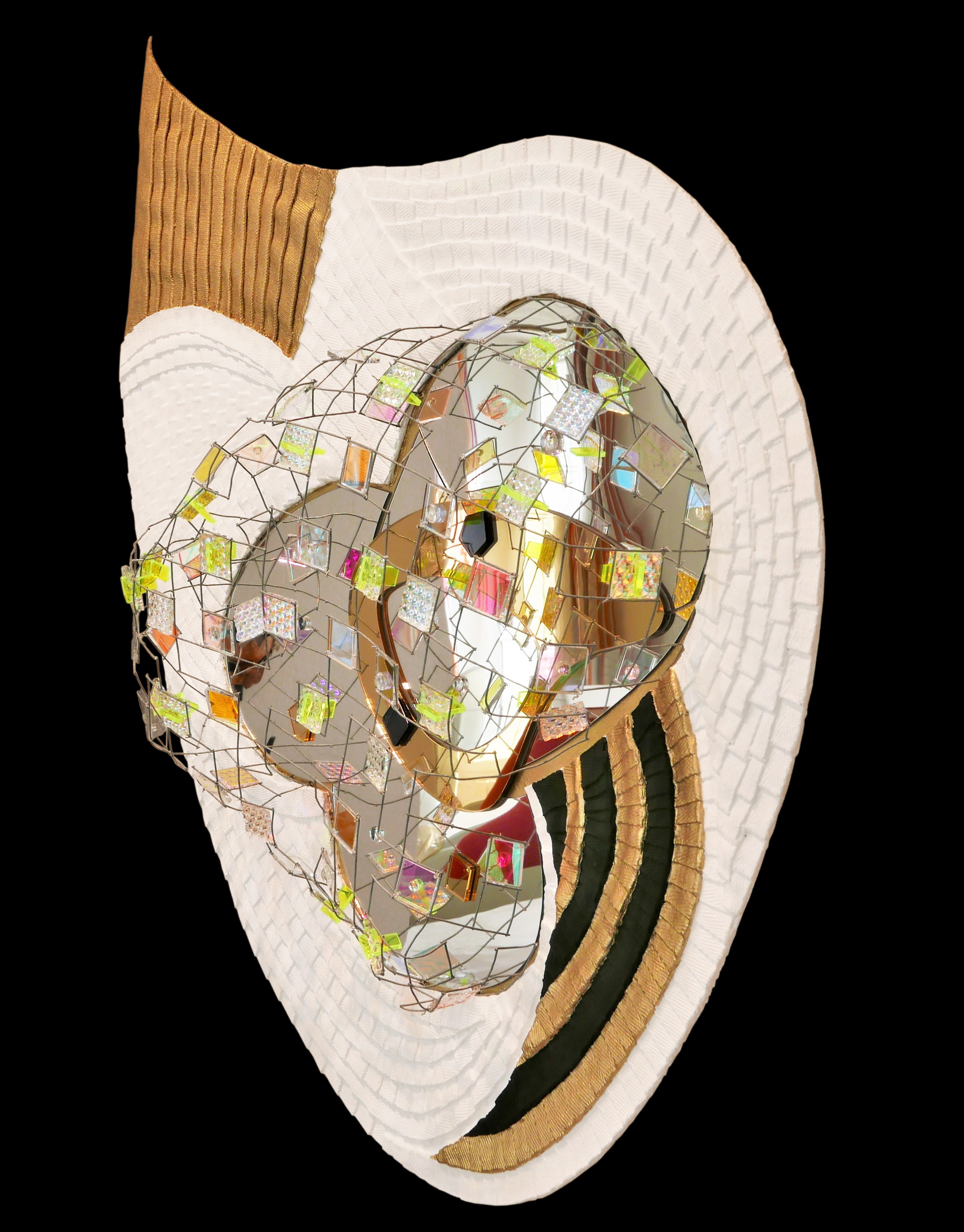 A white hat with a gold band and a mosaic design.