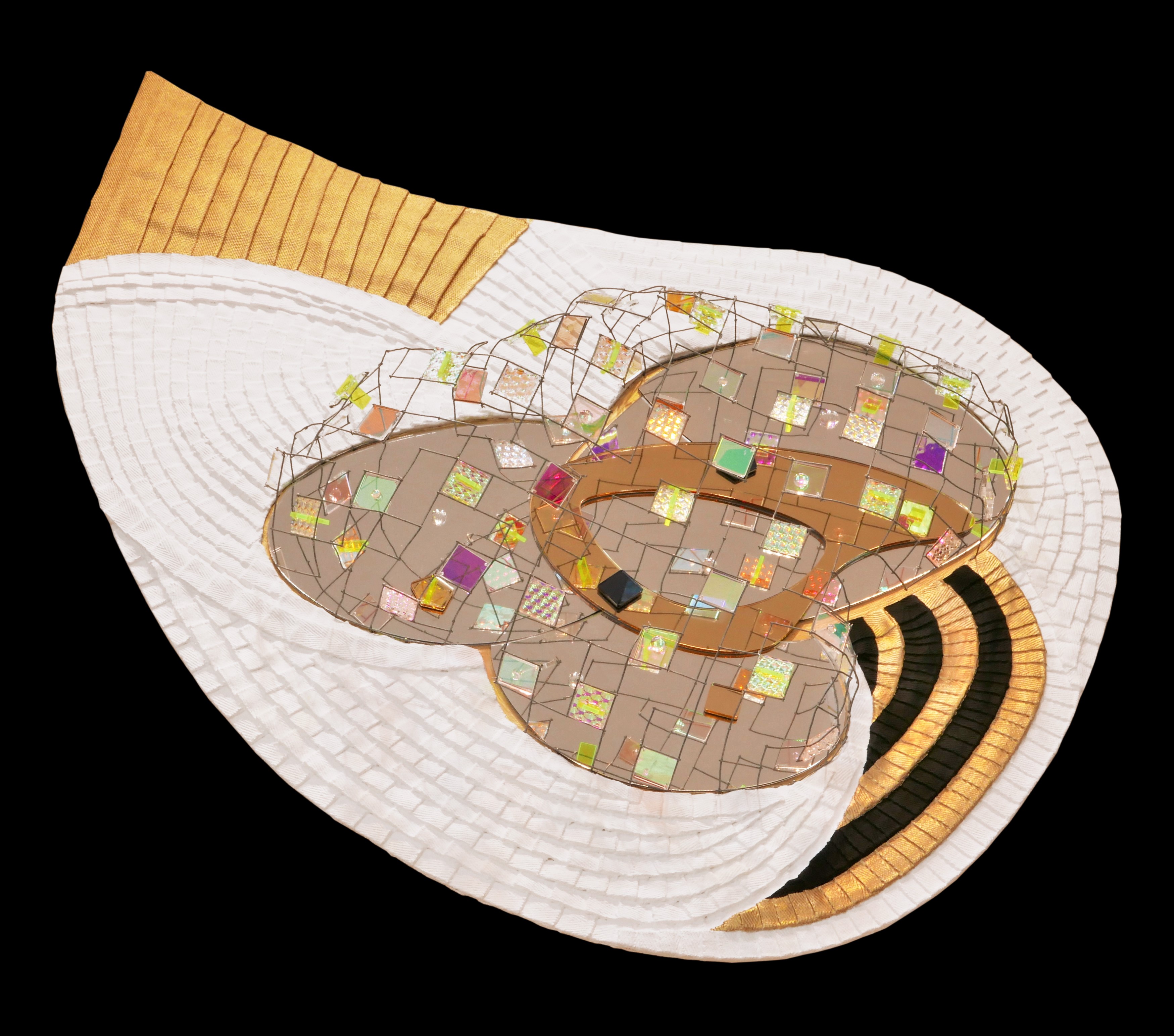 A white hat with a gold band and a mosaic design.
