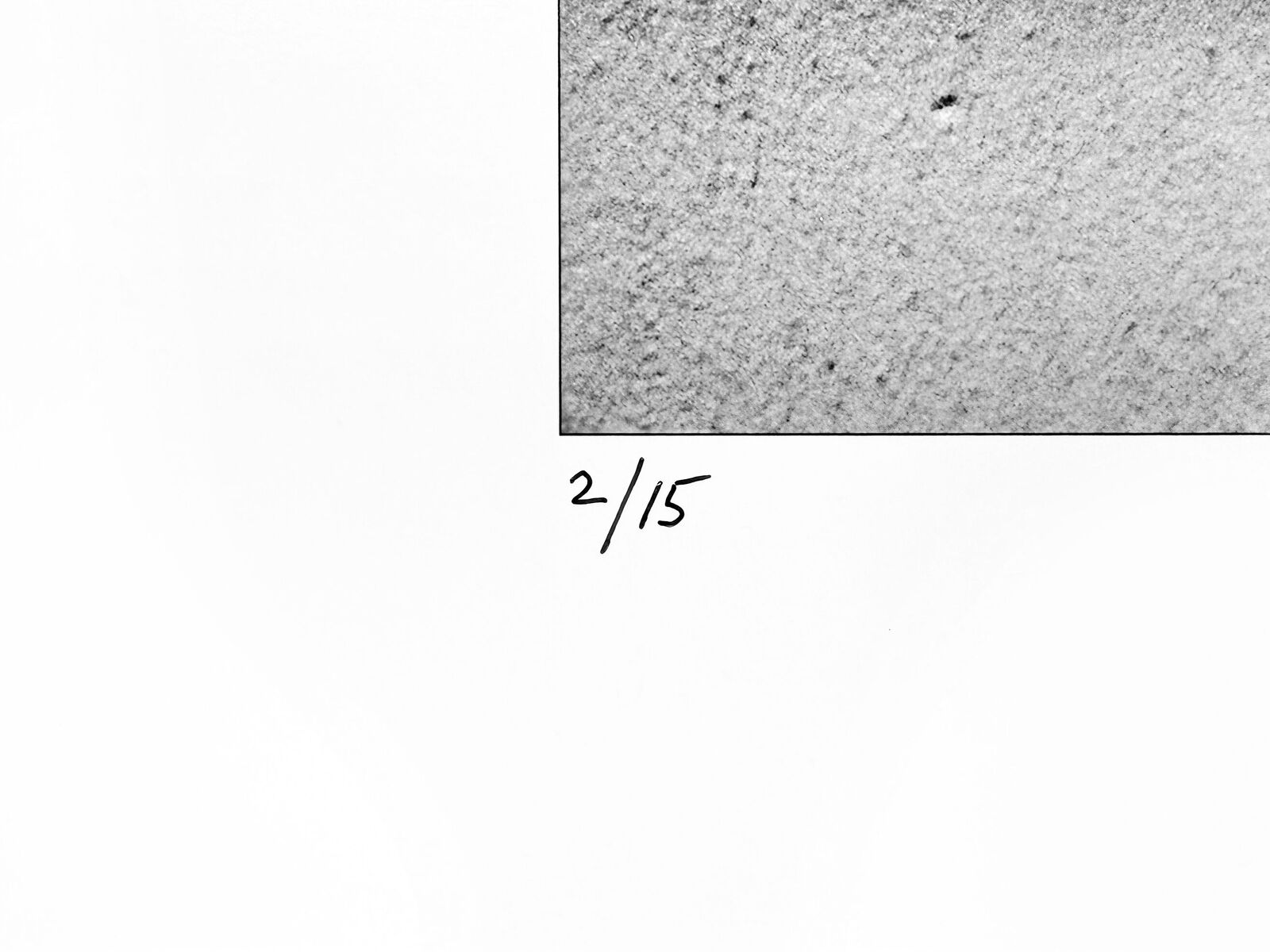 A black and white photo of a man wearing a mask.