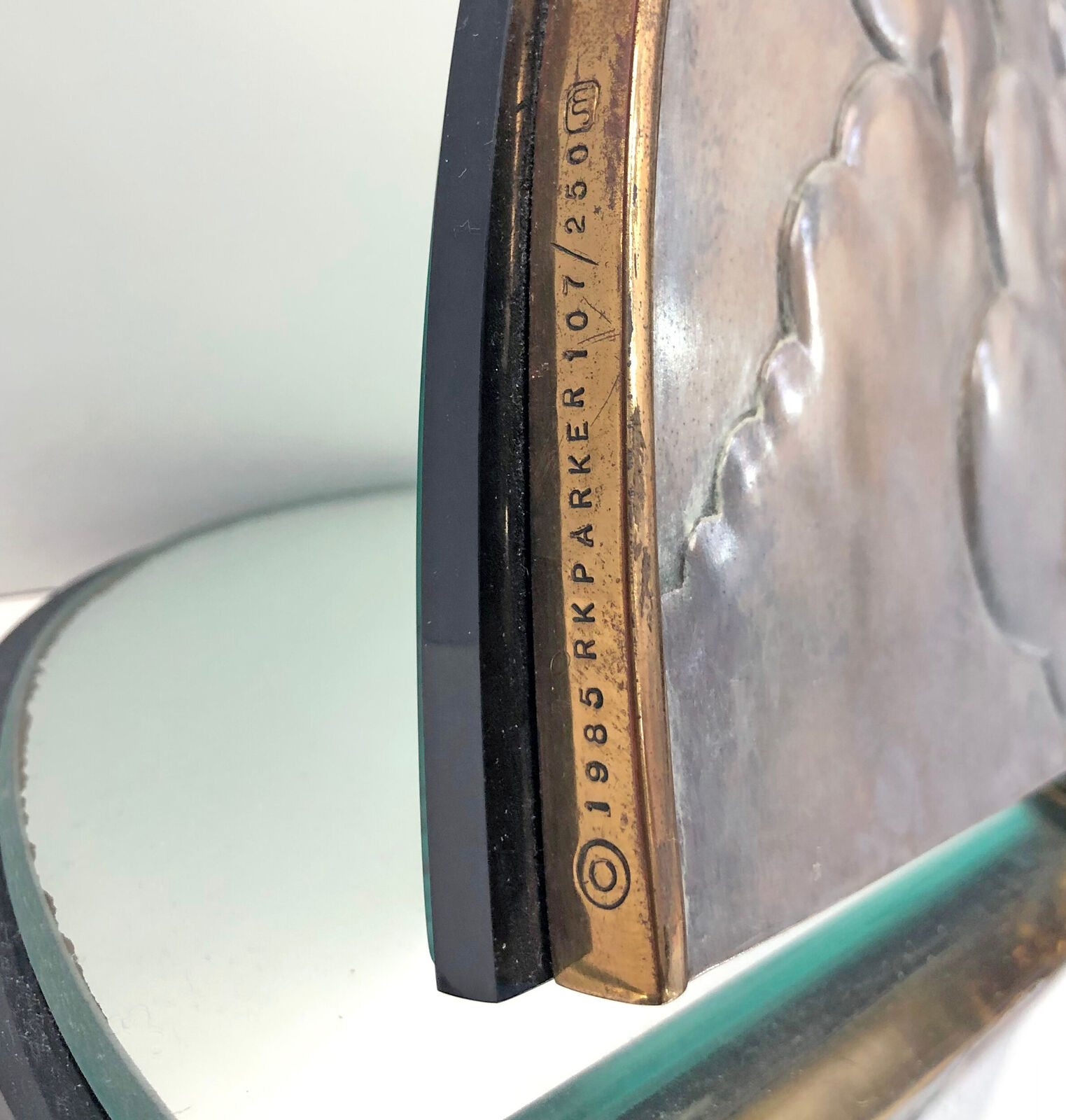 A glass box with a picture of a woman on it.