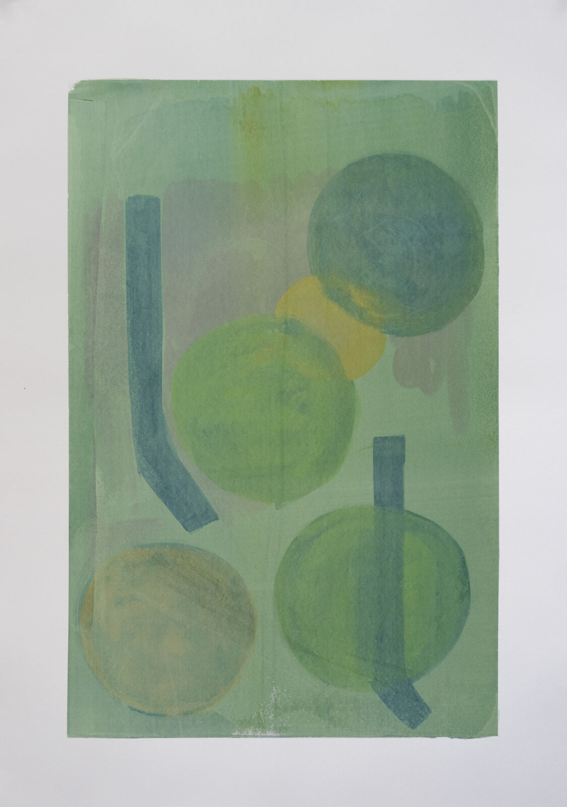 A painting of green and yellow circles on a green background.