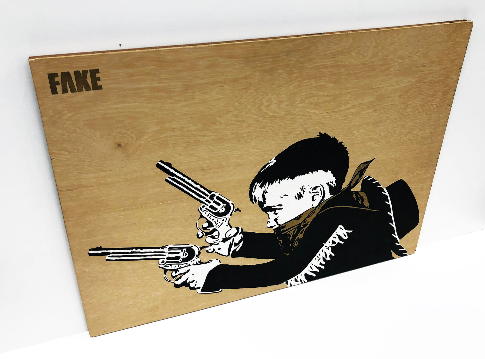 A wooden sign with a drawing of a boy holding a gun.