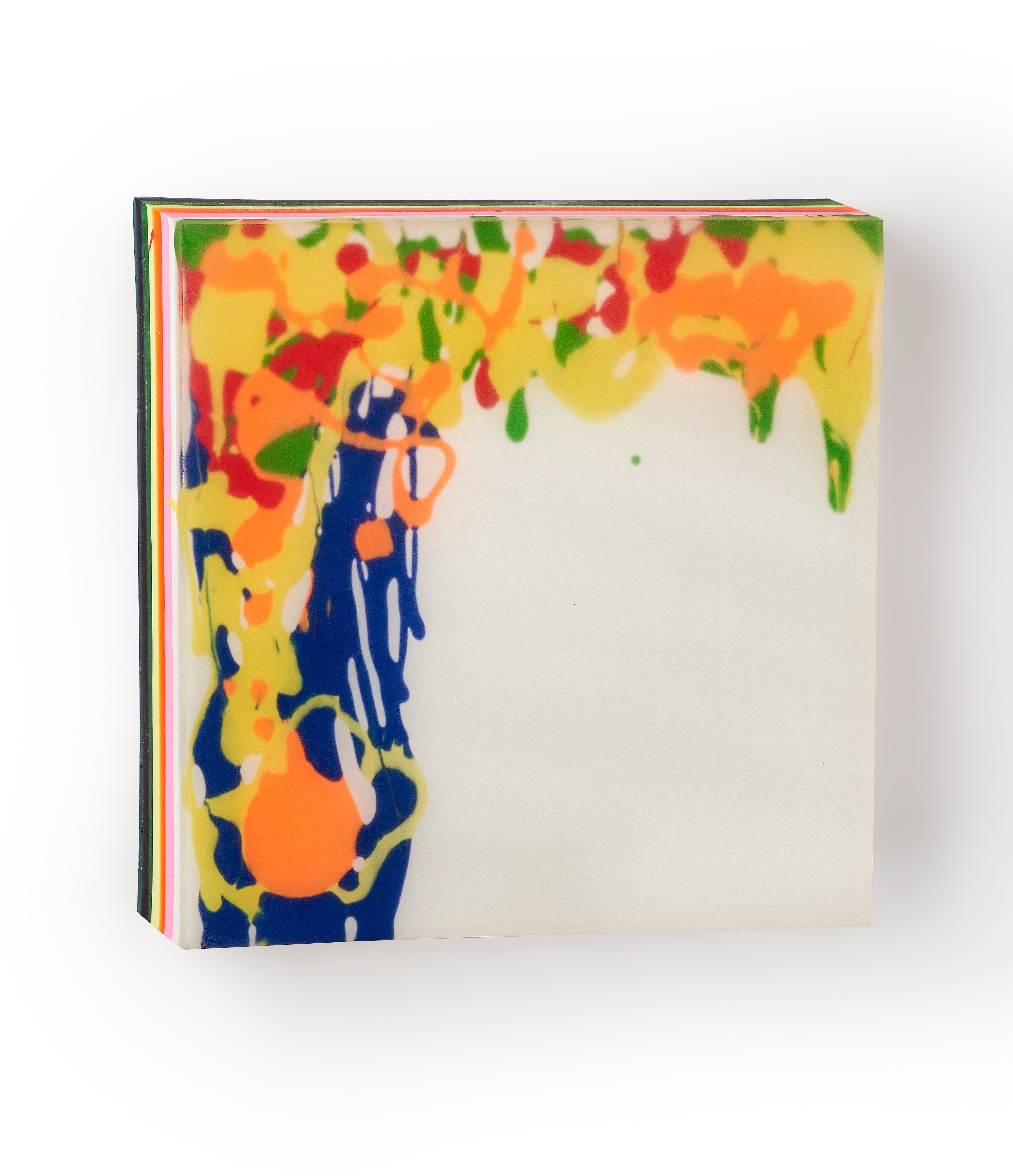 A picture of a colorful painting on a white surface.