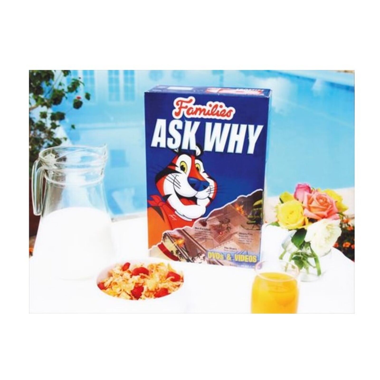 A picture of a box of cereal and a glass of milk.